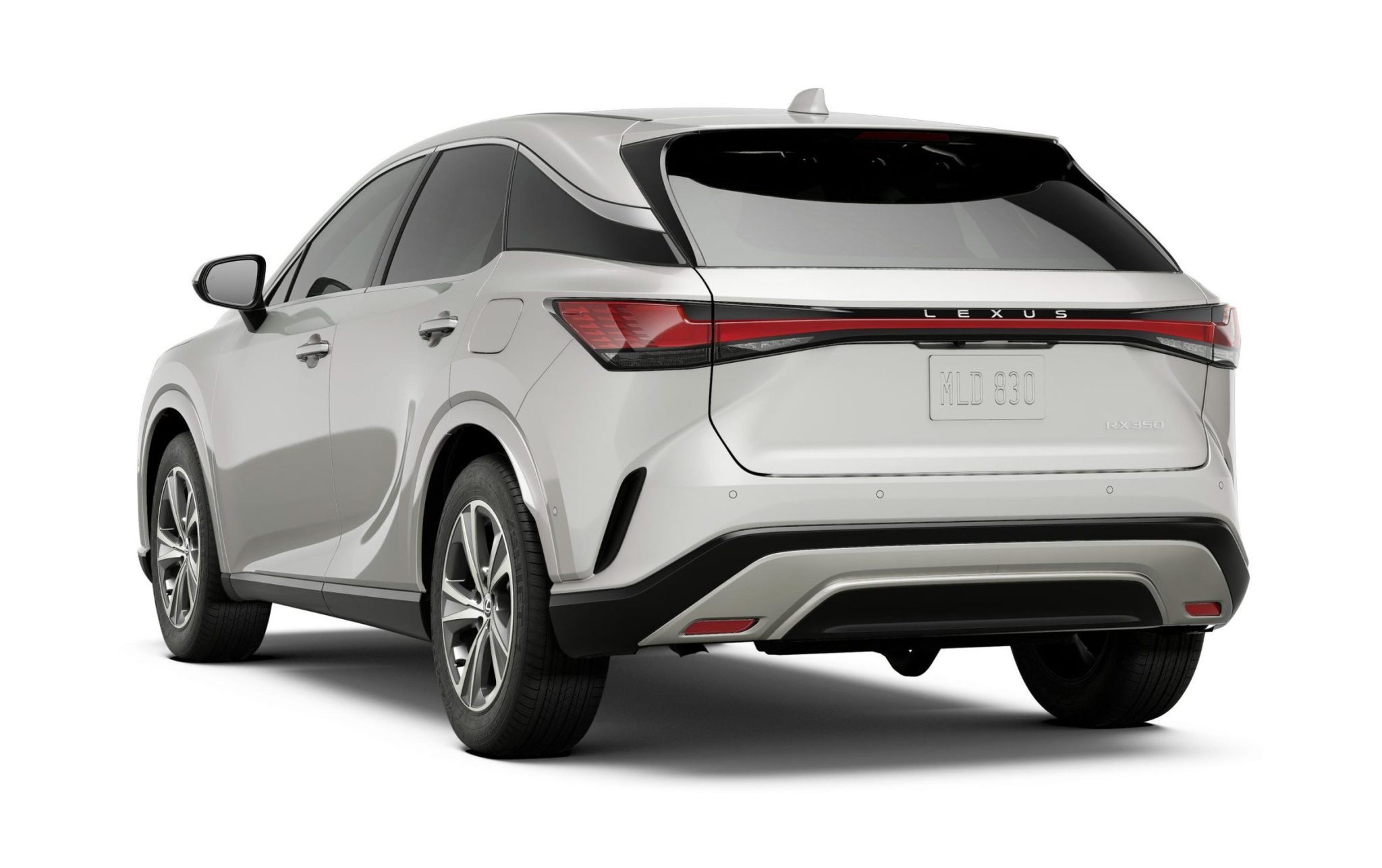 Rear view of the 2025 Lexus RX 350, highlighting its sleek body lines, stylish alloy wheels, and modern sculpted design.