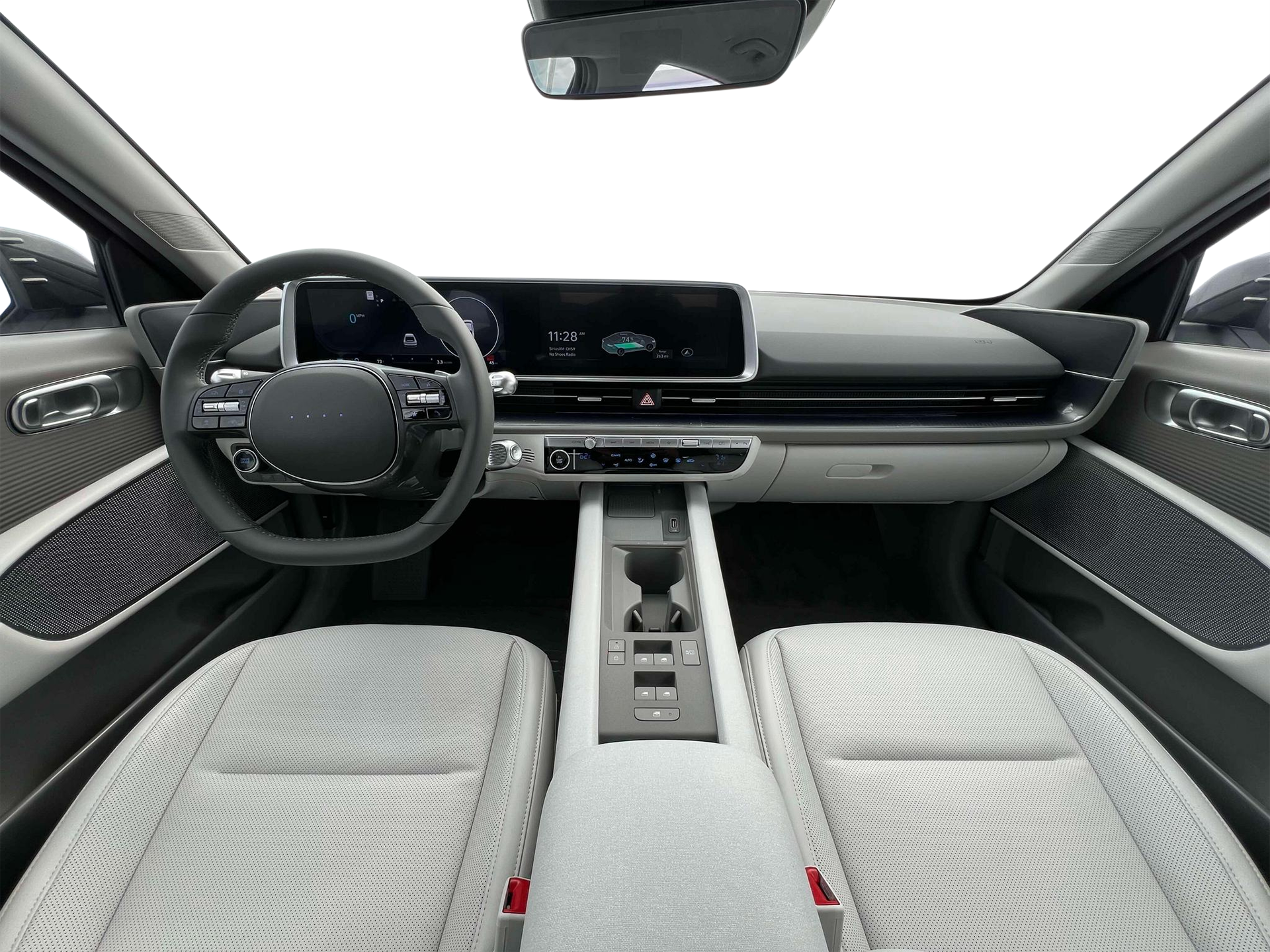 Interior dashboard of the 2025 Hyundai IONIQ-6, featuring a minimalist cockpit with dual 12.3-inch digital displays, modern steering wheel, and advanced EV controls.