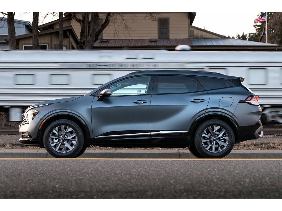 Side profile of 2025 hybrid crossover SUVs including Toyota RAV4 and Kia Sportage from best hybrid crossover review