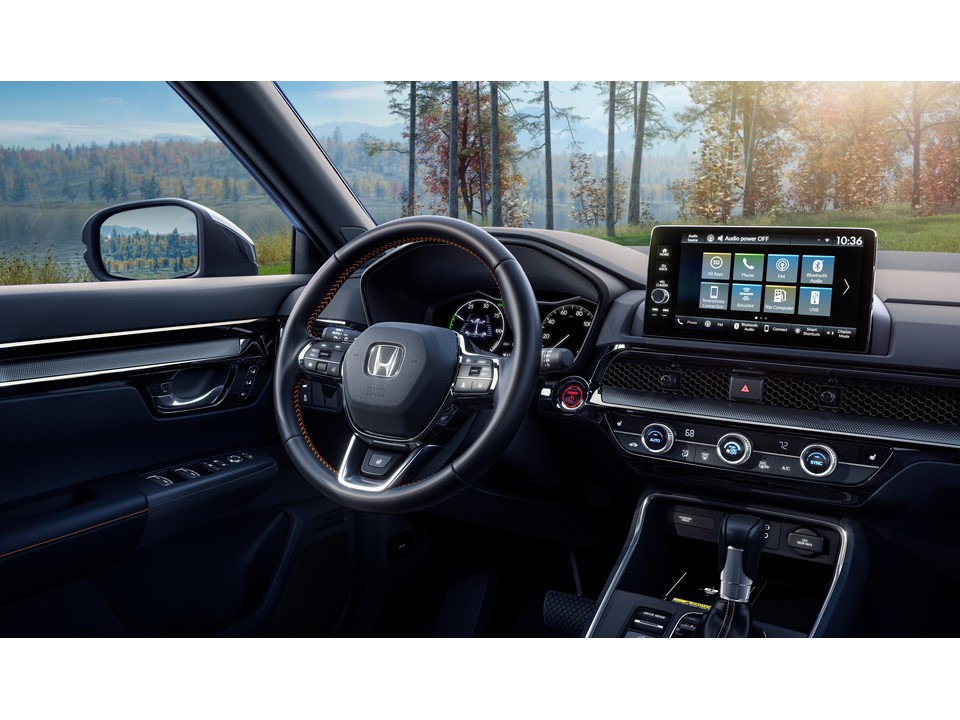 Interior dashboard of 2025 Kia Sportage Hybrid from best hybrid crossover review showcasing hybrid SUV tech