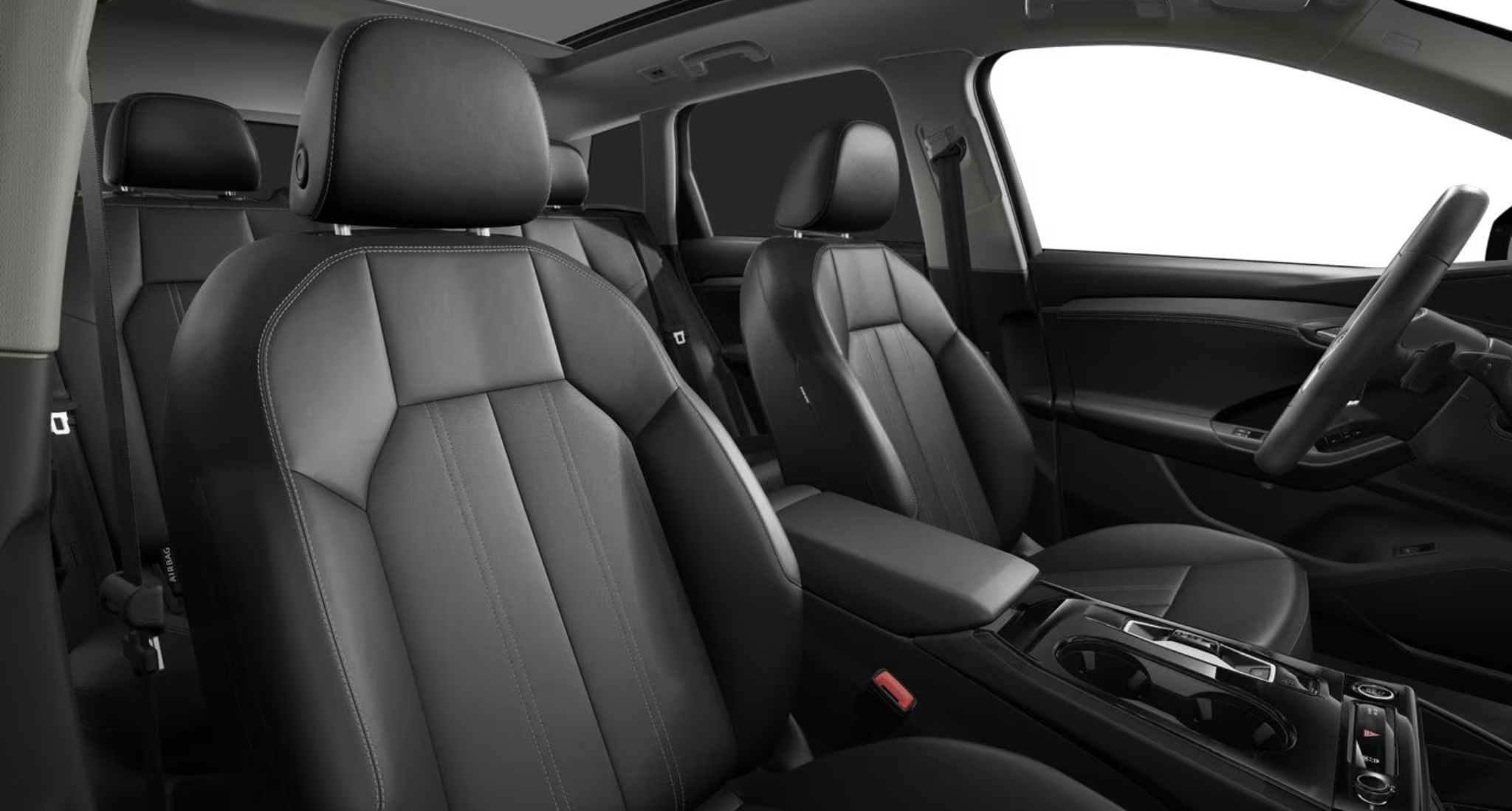 Luxurious black leather seats in the 2025 Audi Q6 e-tron, featuring ergonomic design, contrast stitching, and a spacious cabin.