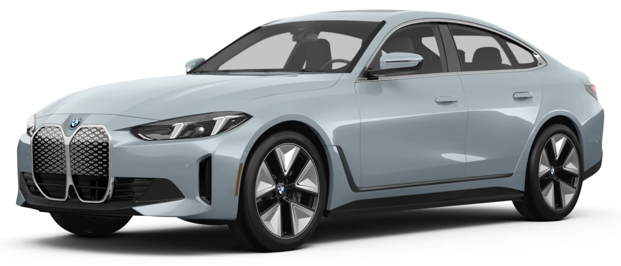 Sleek front view of the 2025 BMW i4 lease sedan in a modern city setting.