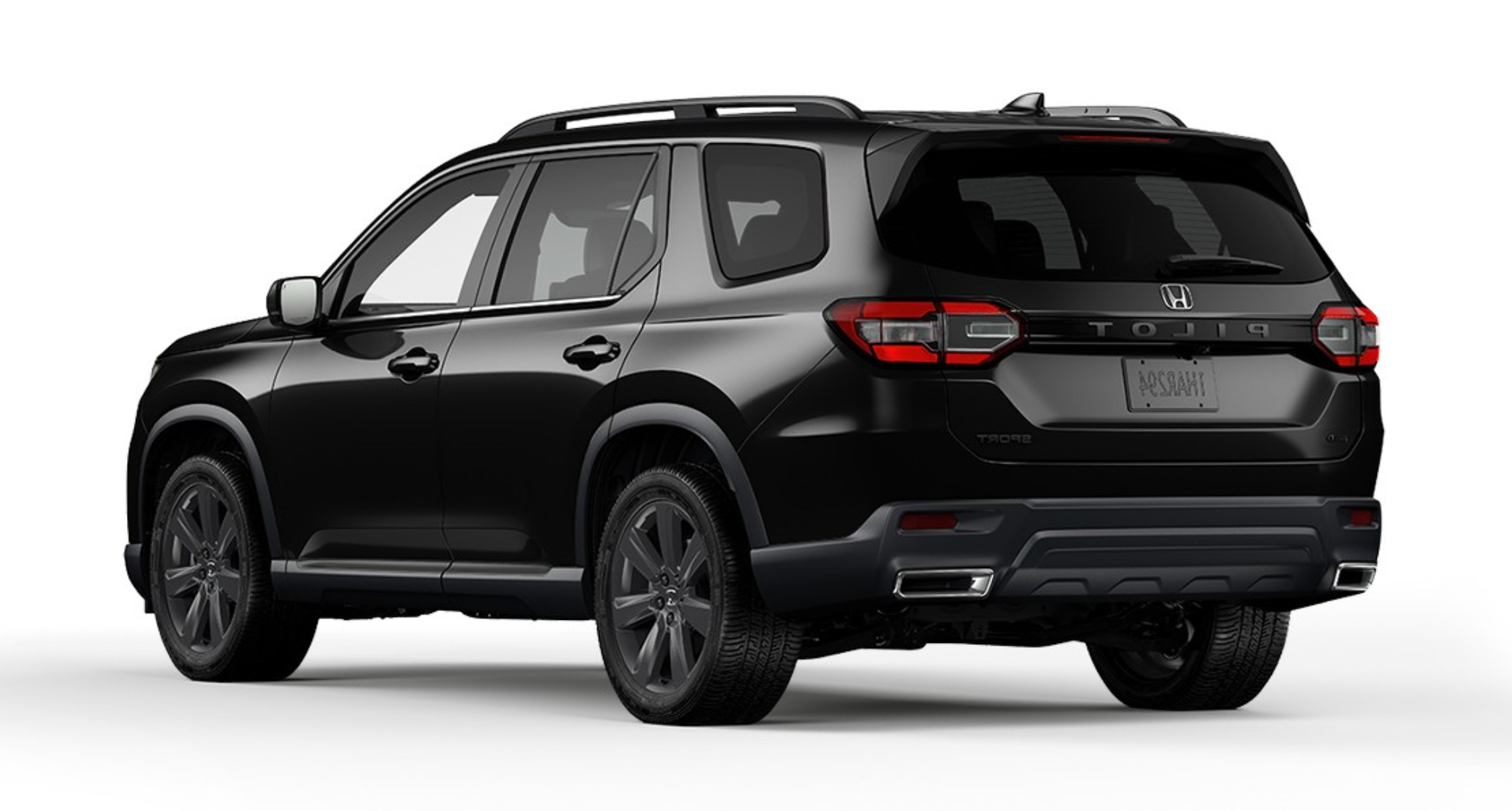 Rear exterior view of the sleek black 2025 Honda Pilot Sports AWD showcasing modern LED taillights and distinctive SUV styling.