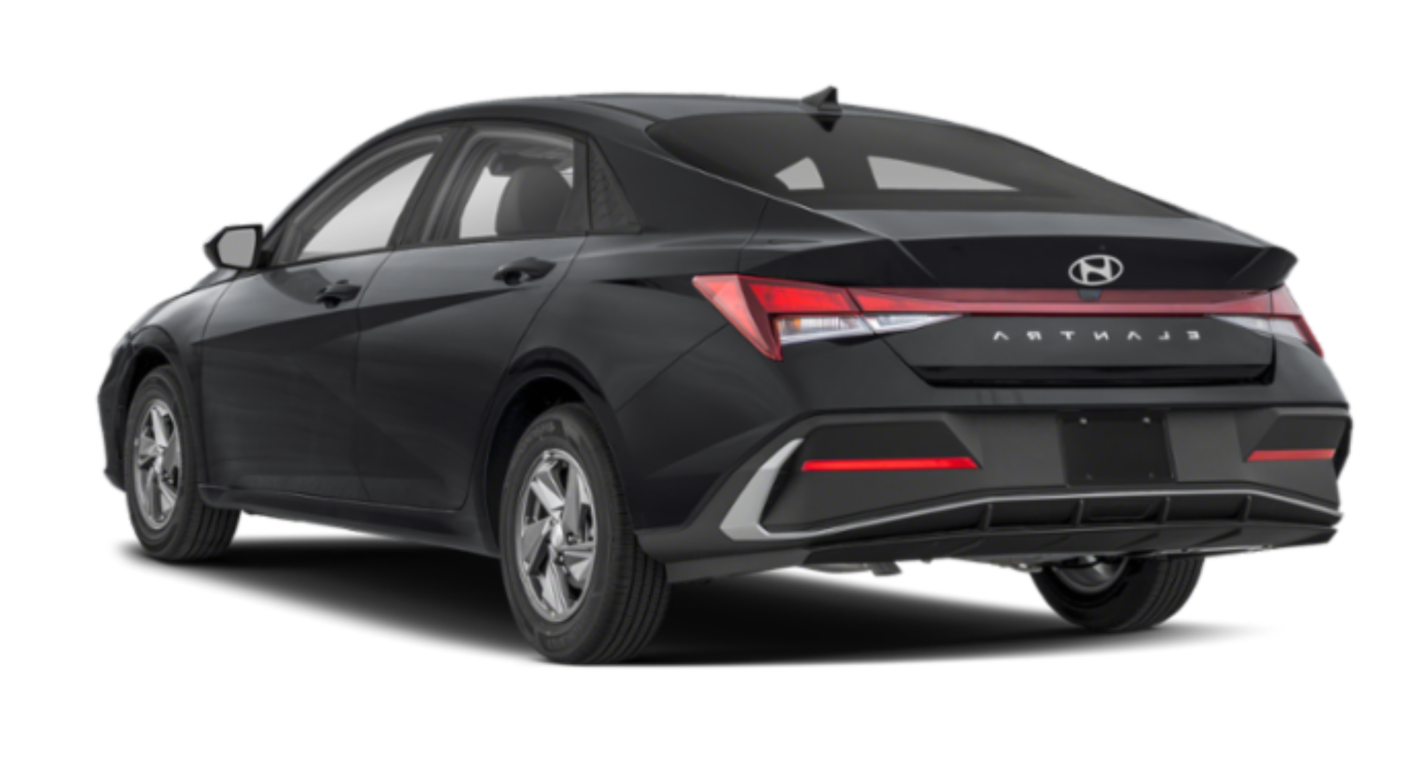 Rear exterior view of the 2025 Hyundai Elantra SE, featuring distinctive LED taillights, sporty rear bumper design, and the Hyundai emblem prominently displayed.