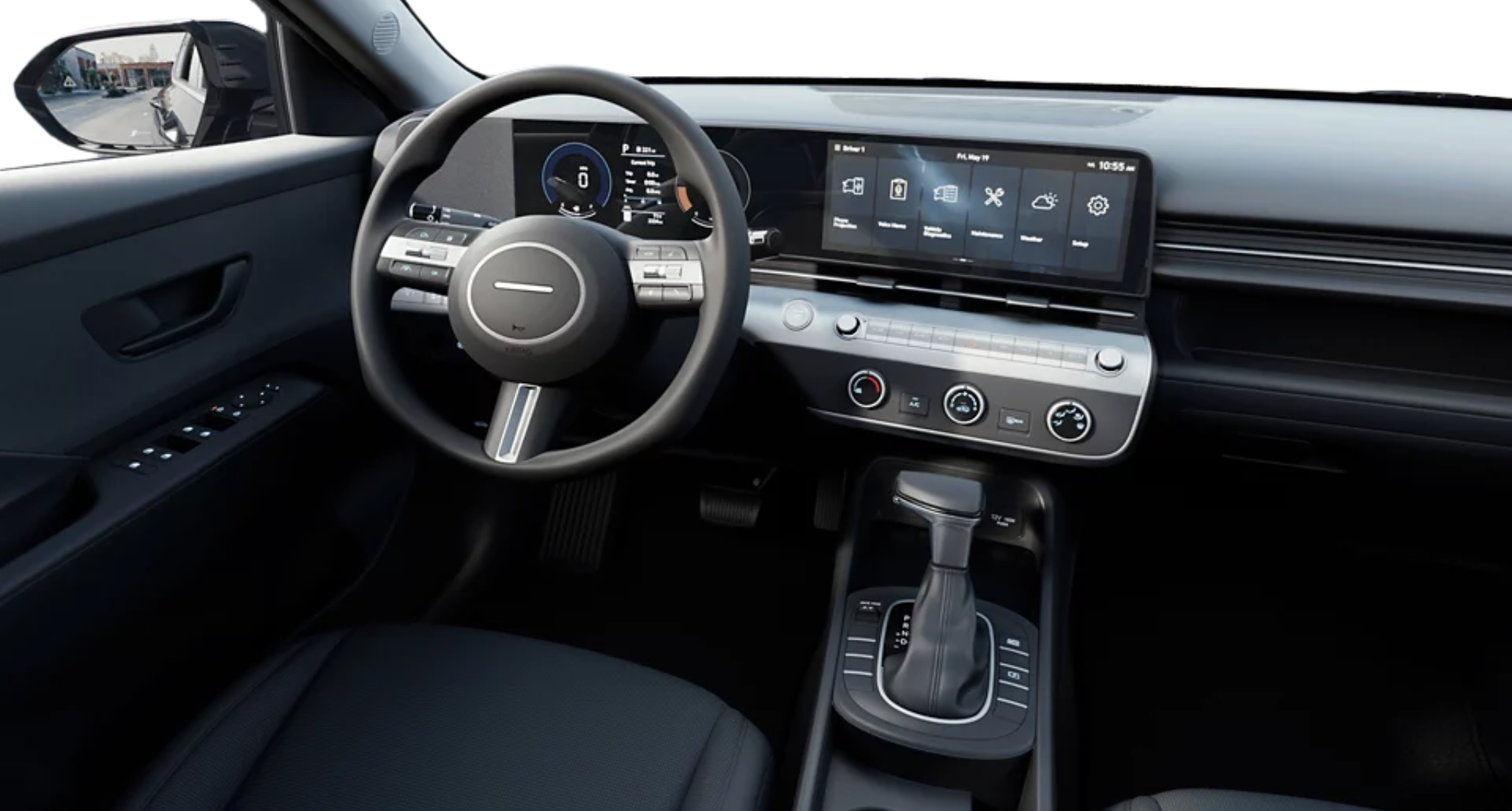 Interior view of the 2025 Hyundai Kona SE dashboard, showcasing a 12.3-inch touchscreen infotainment system, digital gauge cluster, and sleek, modern design with intuitive controls.