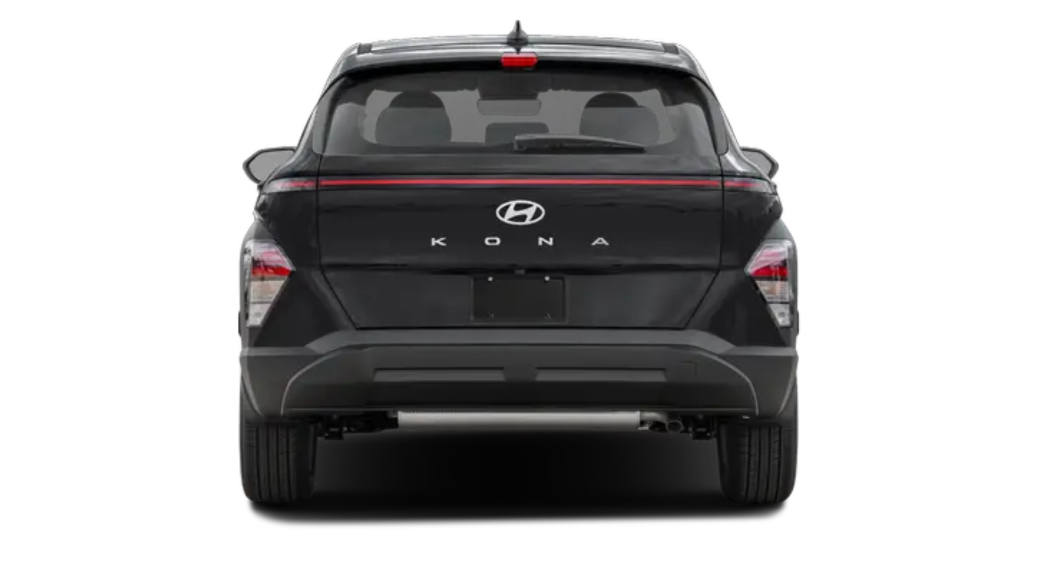 Rear view of the 2025 Hyundai Kona SE in black, featuring LED taillights, a full-width light bar, and the Kona badging prominently displayed on the tailgate.Rear view of the 2025 Hyundai Kona SE in black, featuring LED taillights, a full-width light bar, and the Kona badging prominently displayed on the tailgate.