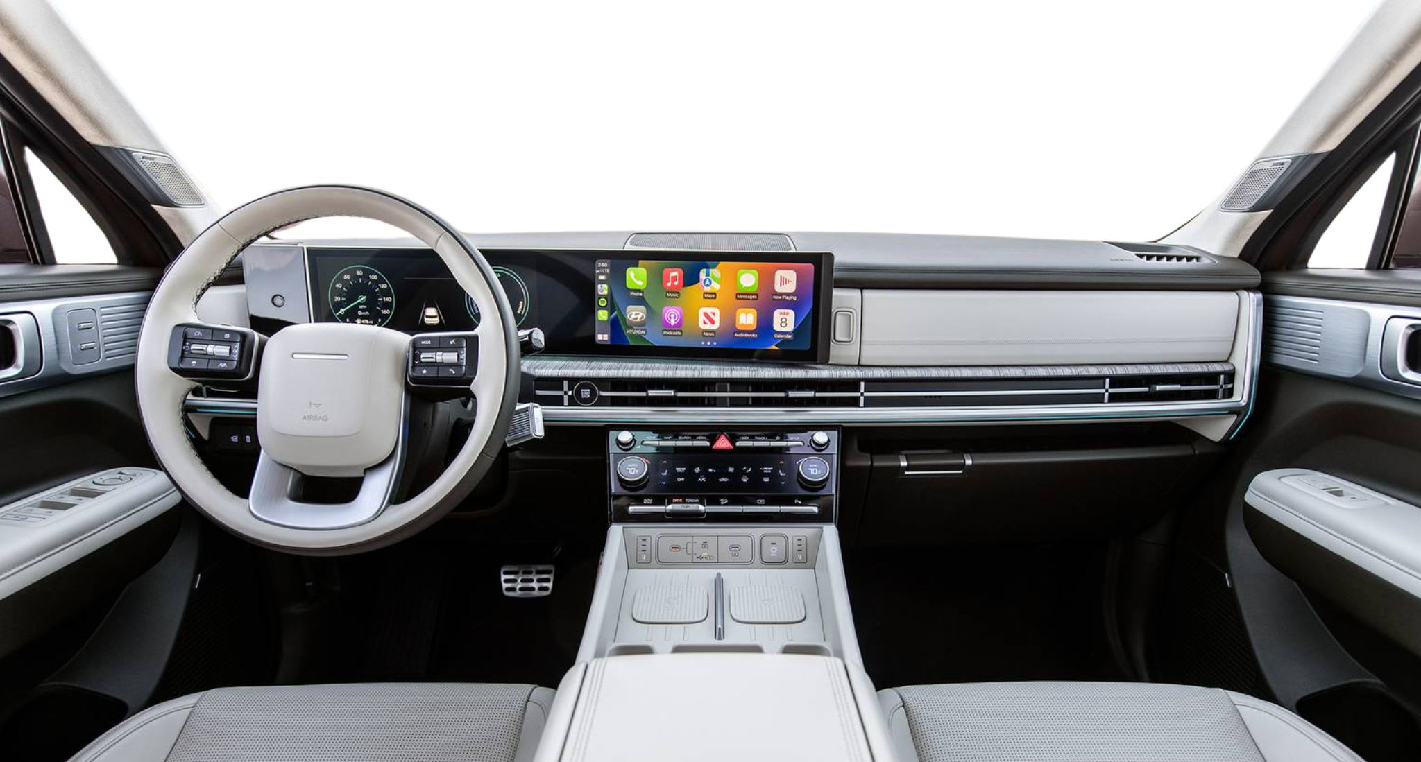 Modern interior dashboard of the 2025 Hyundai Santa Fe SE featuring a 12.3-inch touchscreen display with Apple CarPlay, premium materials, and a sleek digital instrument cluster.