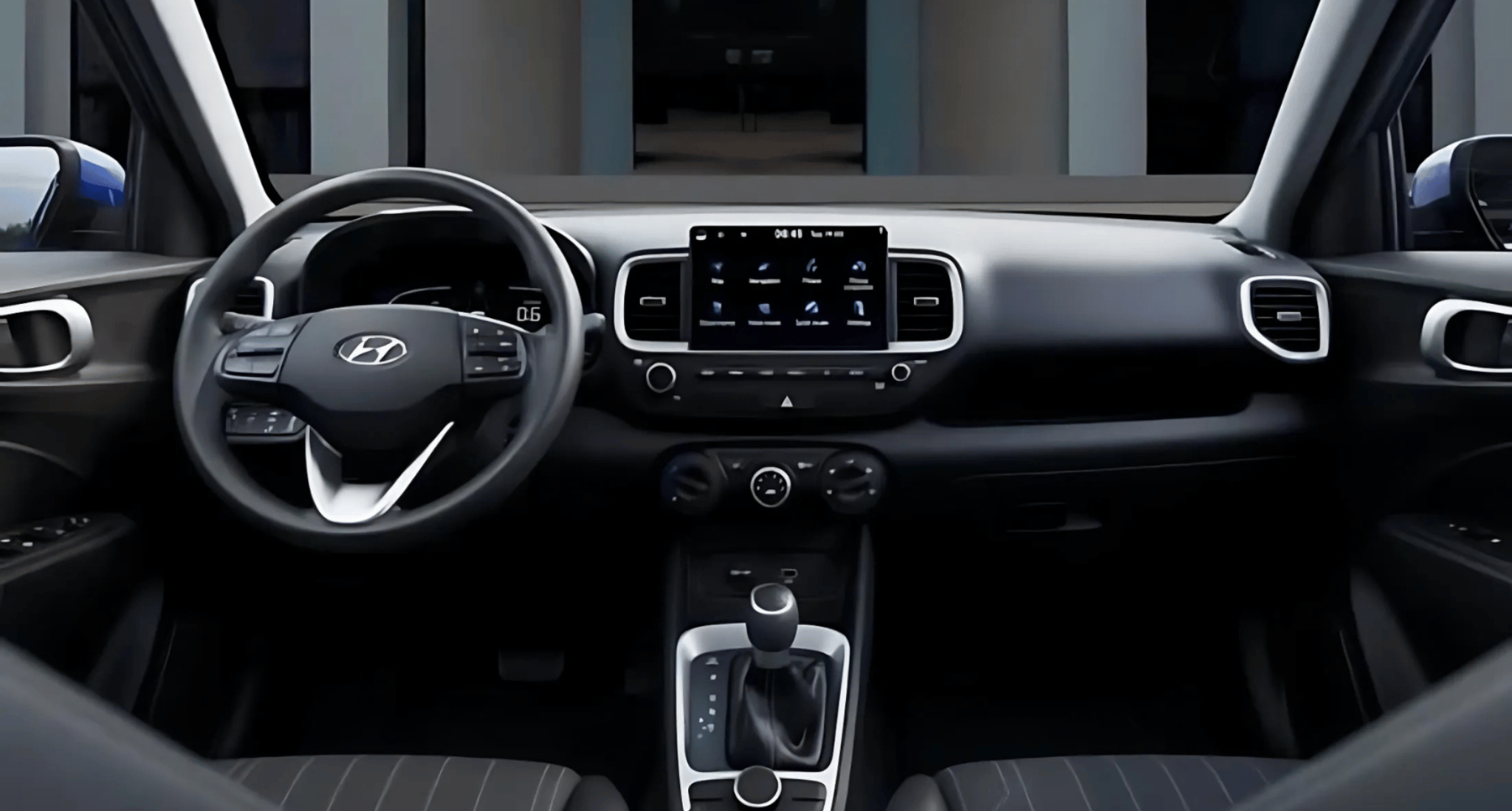 Interior dashboard of the 2025 Hyundai Venue SE featuring an 8-inch touchscreen display with wireless Apple CarPlay and Android Auto, and a modern steering wheel with integrated controls.