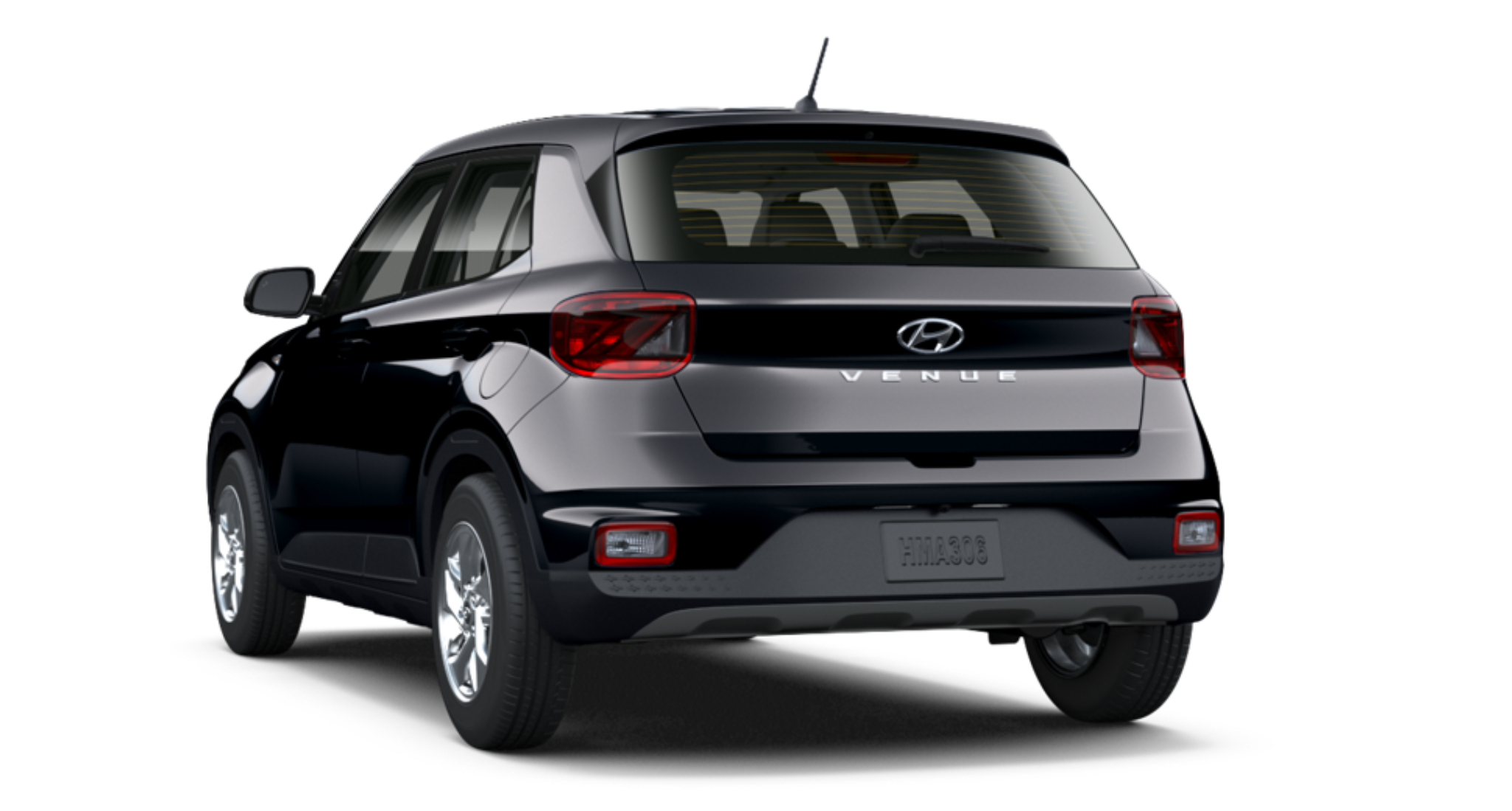 Rear exterior view of the 2025 Hyundai Venue SE showcasing LED taillights, rear windshield wiper, and Hyundai branding, emphasizing its urban-friendly design.