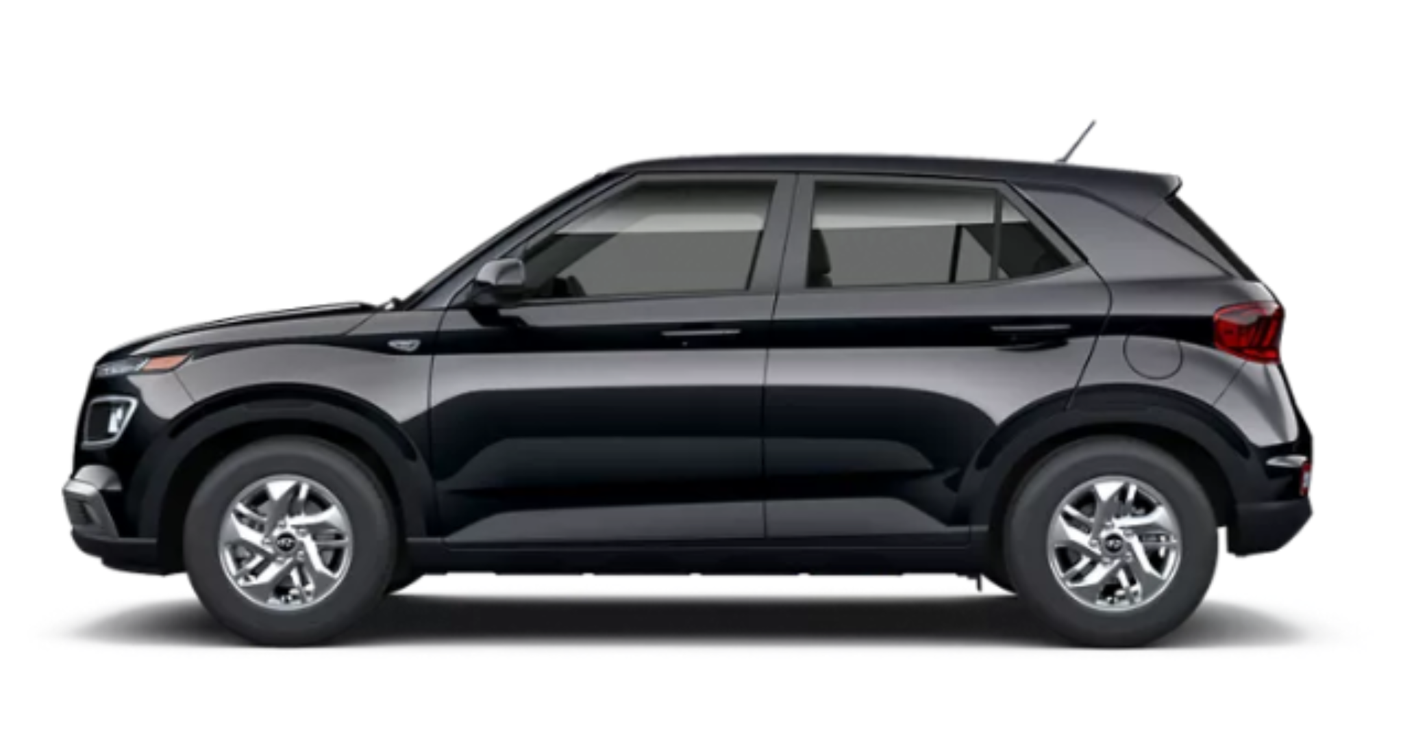 Side profile view of the 2025 Hyundai Venue SE in black, highlighting its compact SUV design with 15-inch alloy wheels and sleek body lines.