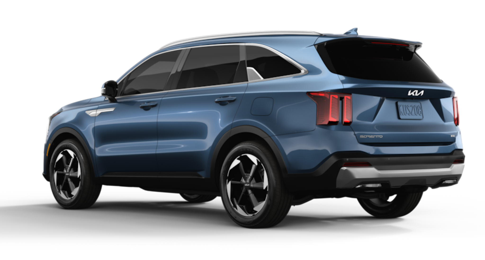 Rear view of the 2025 Kia Sorento Hybrid EX in Mineral Blue, highlighting the LED taillights, Sorento badging, and sporty rear bumper design.