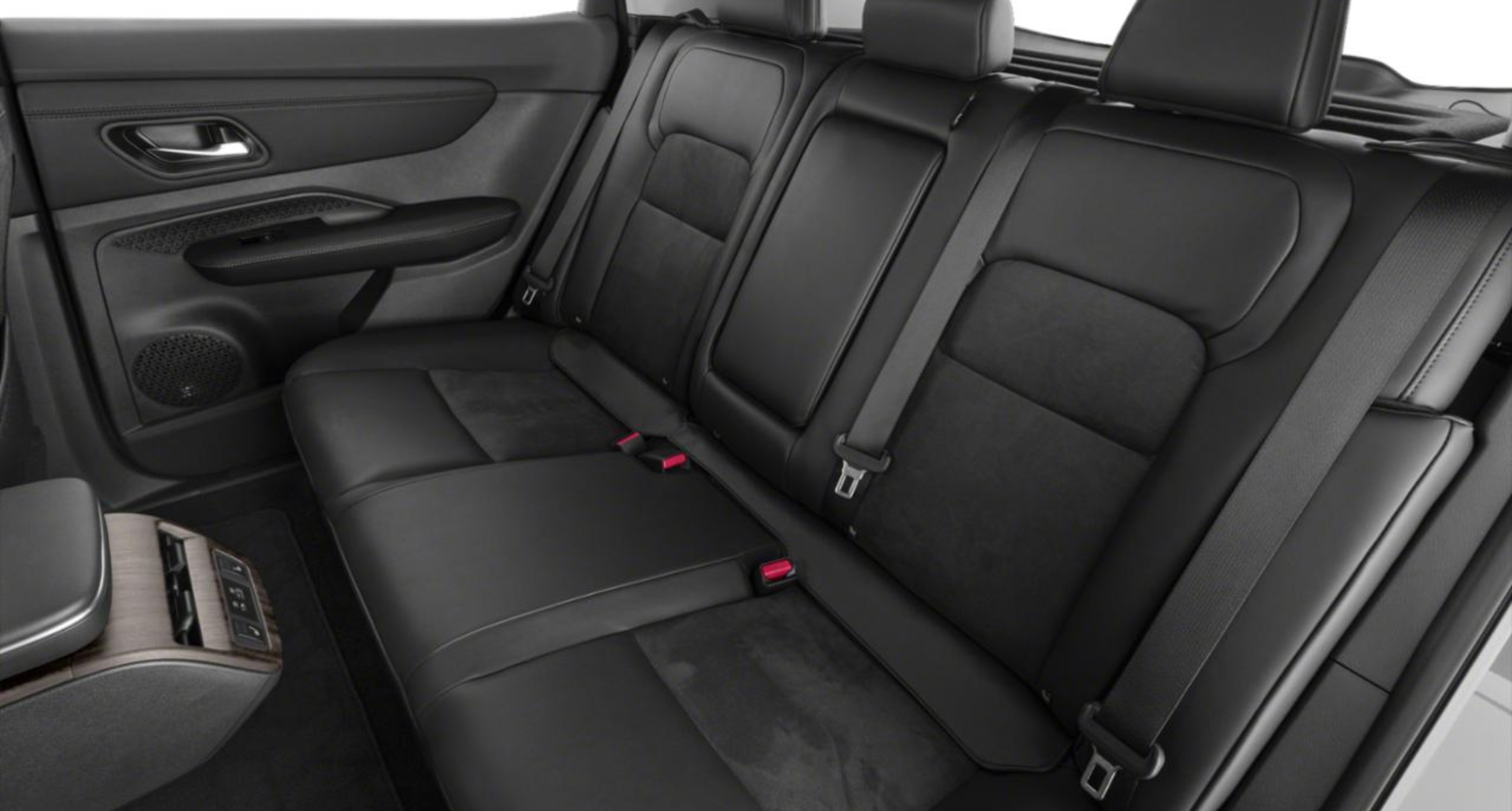 Rear view of the 2025 Nissan Ariya Engage FWD featuring spacious black leatherette rear seats with a foldable center armrest and modern interior detailing.