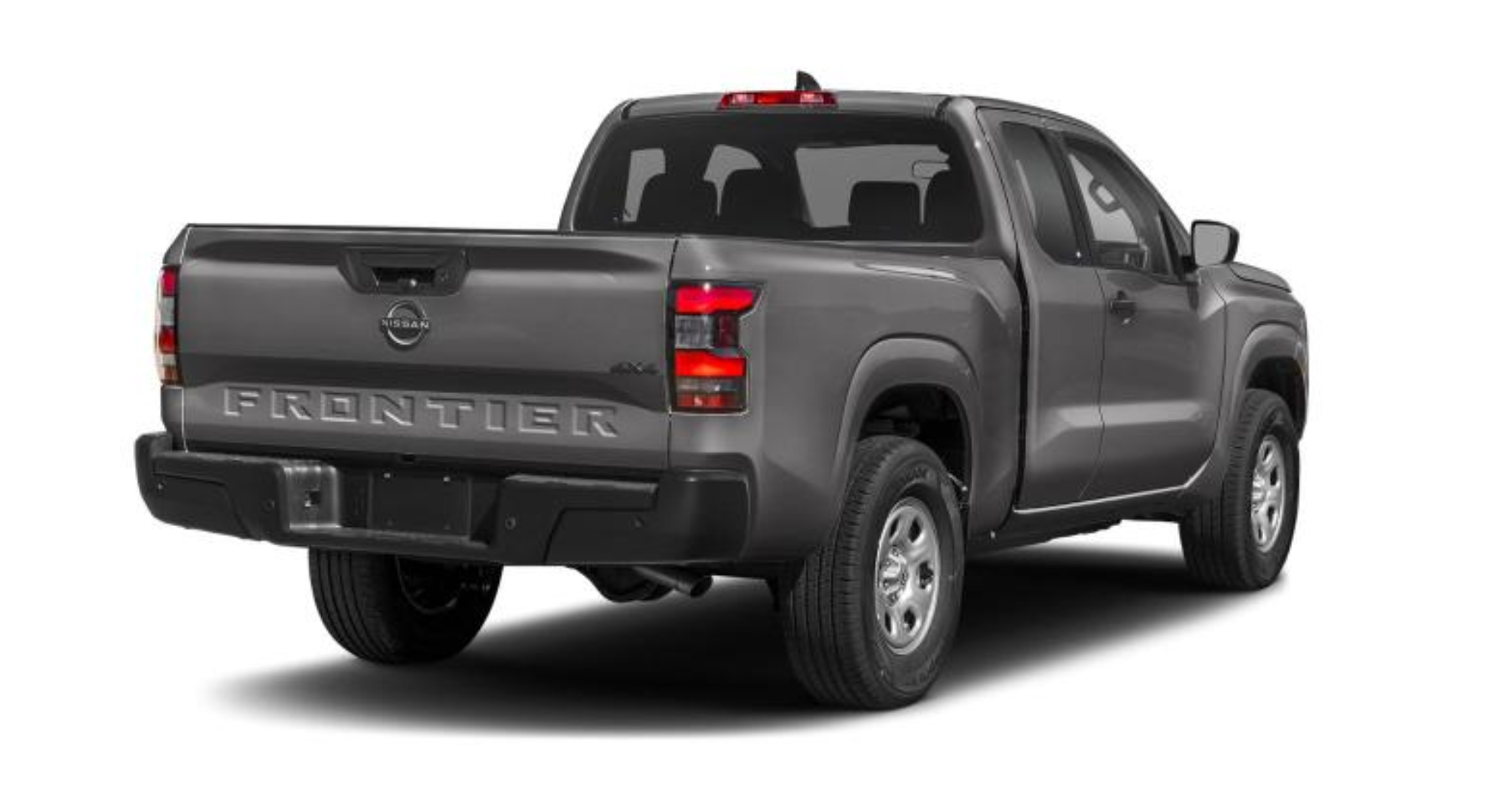 Rear exterior view of the 2025 Nissan Frontier King Cab S 4x2 in Gun Metallic color, displaying its bold tailgate design, Frontier logo, and LED taillights.