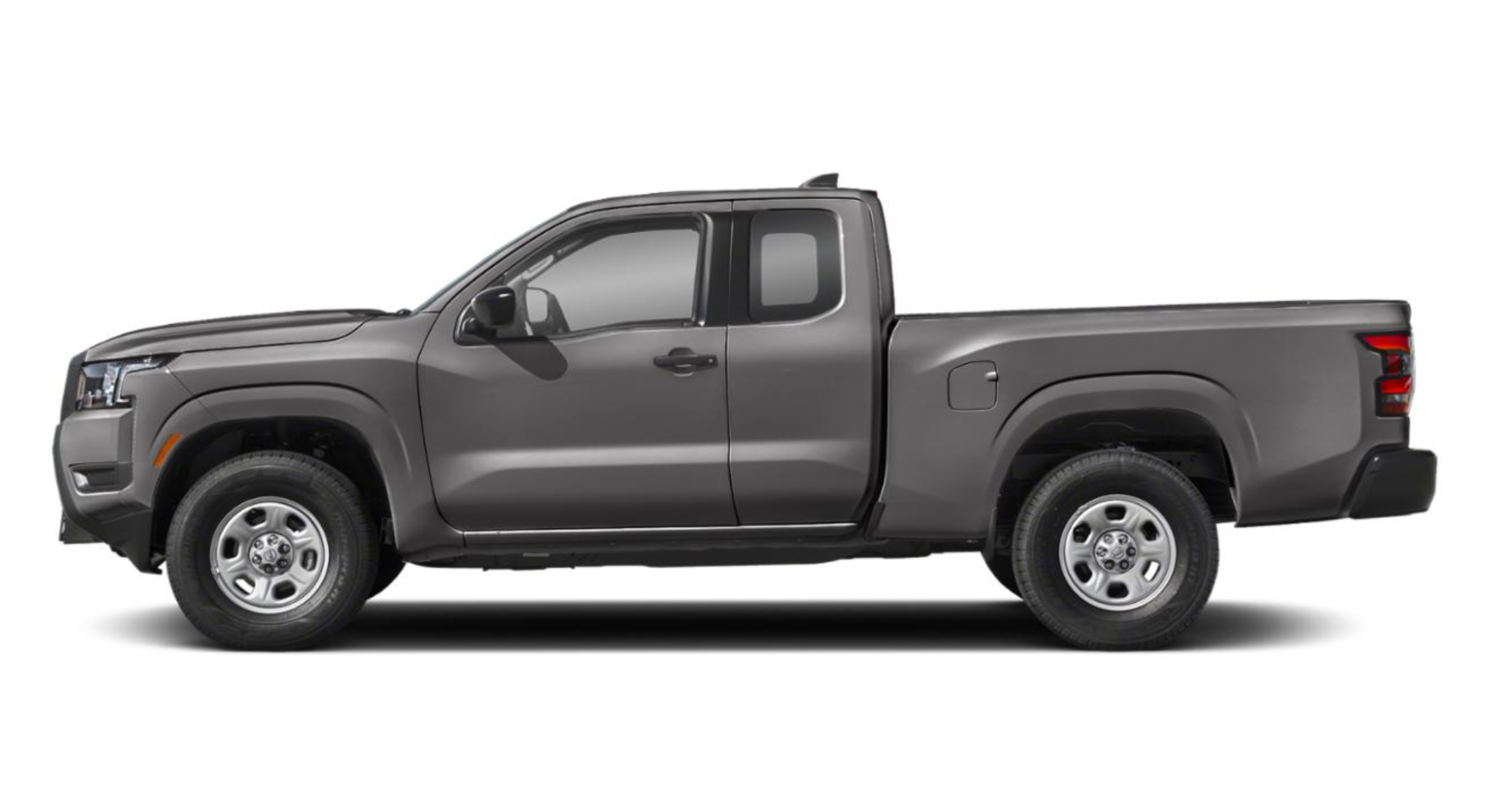 Side profile of the 2025 Nissan Frontier King Cab S 4x2 pickup truck, highlighting its extended cab, aerodynamic body lines, and 16-inch alloy wheels.