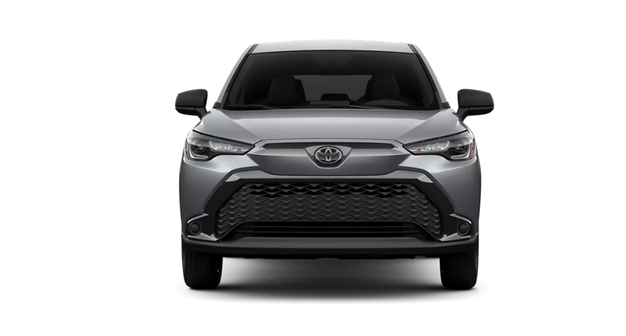 Front view of the 2025 Toyota Corolla Cross Hybrid AWD in Celestite Gray with black mesh grille, LED headlights, and aggressive sport-style bumper design.
