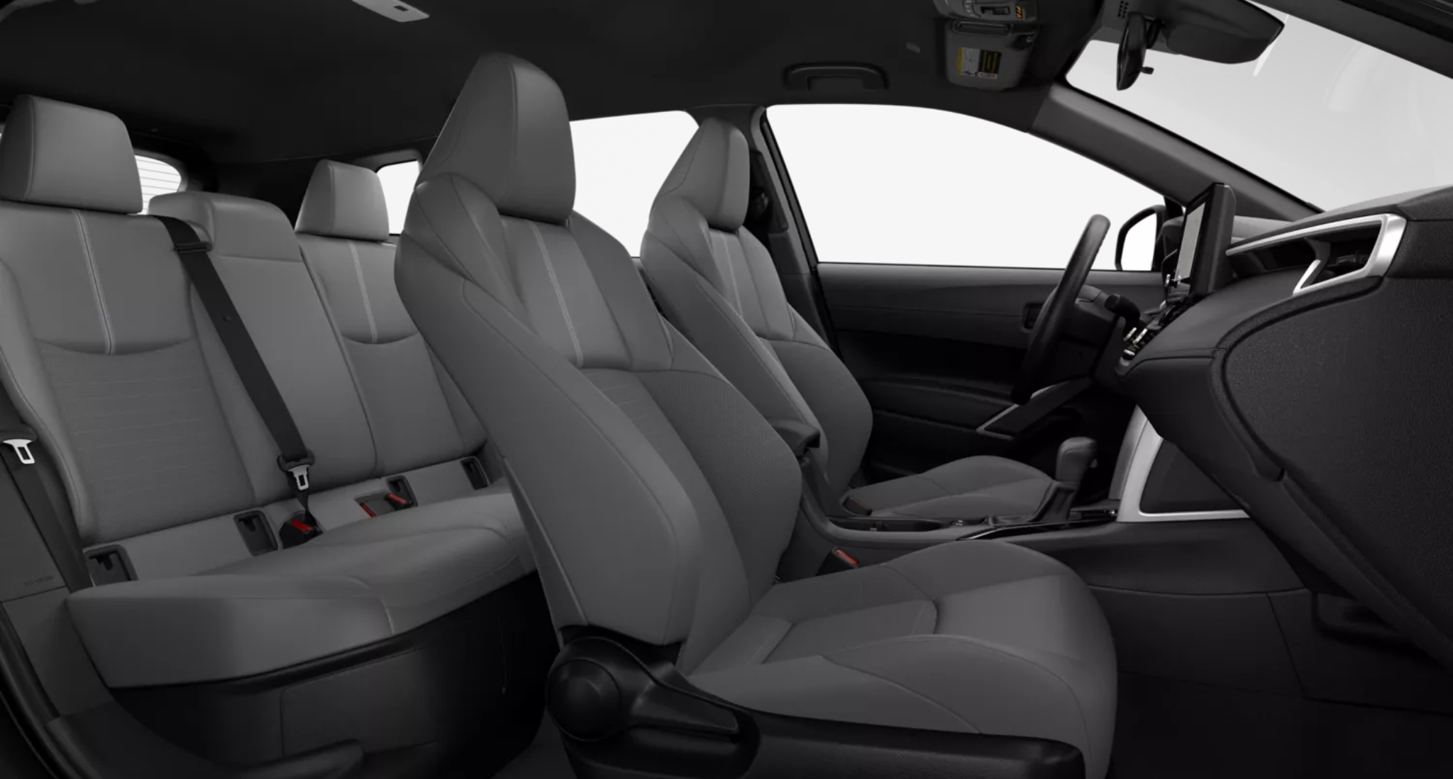 Interior view of the 2025 Toyota Corolla Cross Hybrid AWD featuring fabric-trimmed front and rear seats with 60/40 split-folding rear bench and spacious cabin layout.