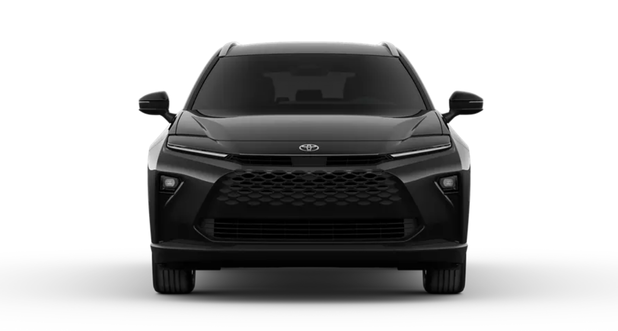 Front view of the 2025 Toyota Crown Signia XLE AWD showcasing its bold black grille, LED projector headlights, and aerodynamic hybrid SUV design