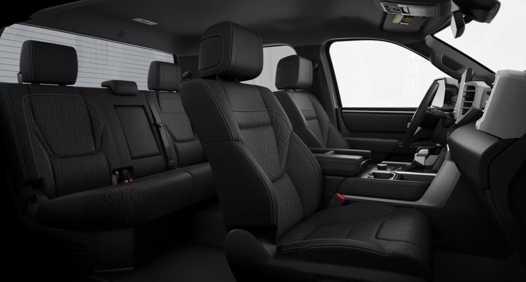 2025 Toyota Tundra Hybrid i-FORCE MAX Limited 4WD interior with black SofTex-trimmed heated and ventilated front and rear seats, showcasing CrewMax cabin comfort and rear sliding window