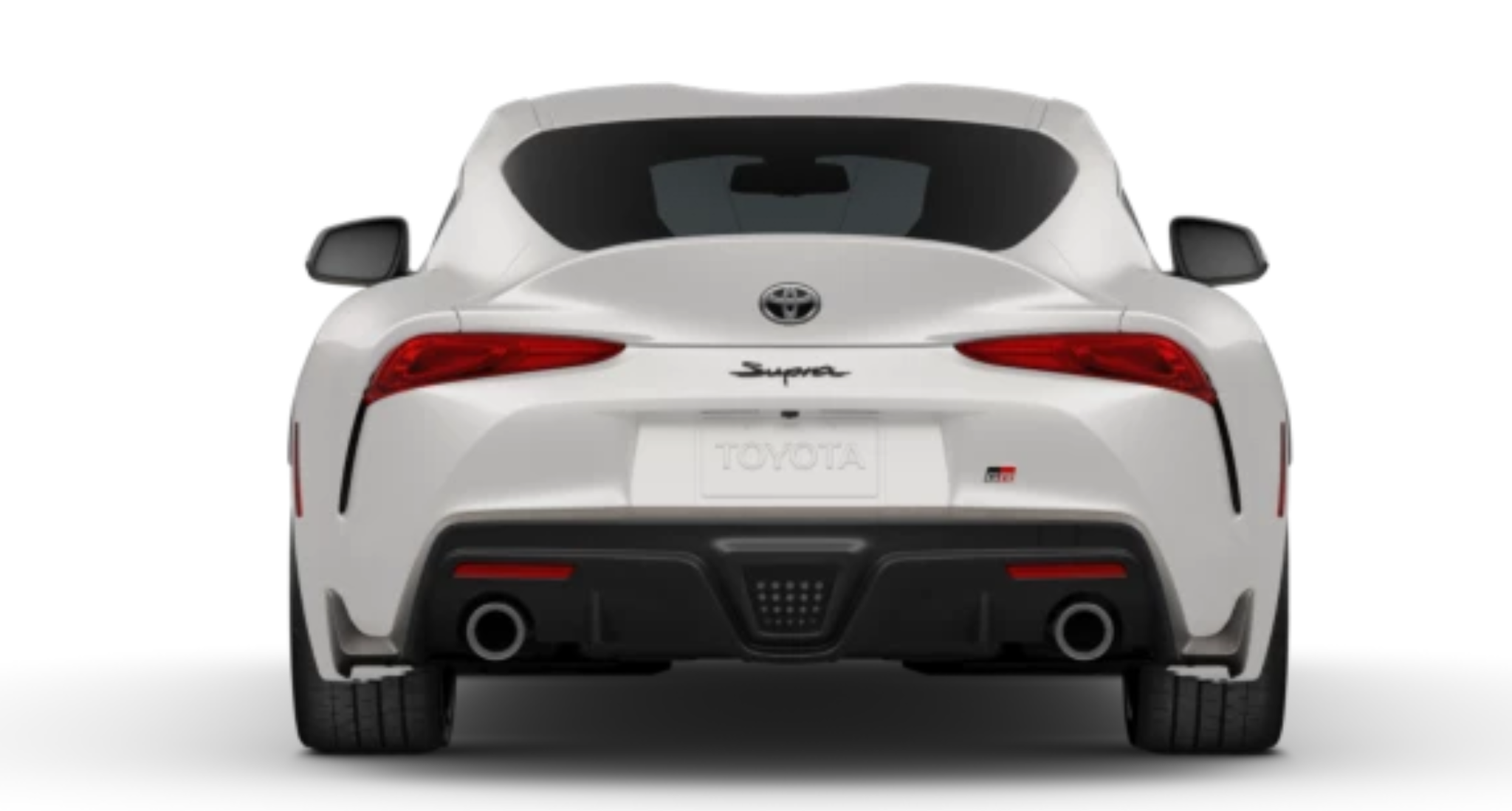 Rear exterior view of the 2025 Toyota GR Supra 3.0 RWD featuring dual exhaust outlets, sleek LED tail lights, and aerodynamic design in white.