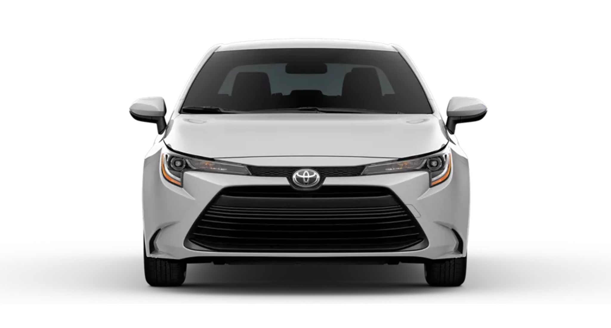 Front view of the 2025 Toyota Corolla LE FWD highlighting LED headlights, bold front grille, and sleek aerodynamic design.