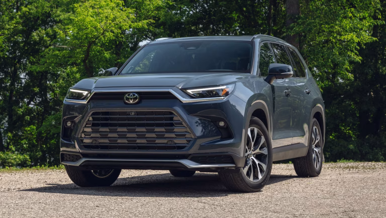 Front view of the 2025 Toyota Grand Highlander Hybrid, showcasing its sleek design as the best hybrid SUV of 2025