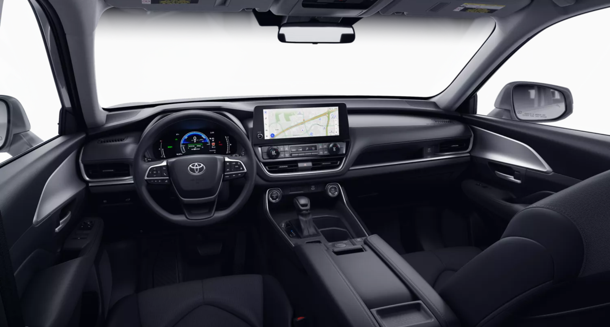 2025 Toyota Grand Highlander Hybrid LE AWD dashboard with 12.3-inch touchscreen, digital instrument cluster, and wireless smartphone integration.