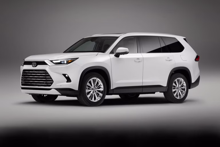 Front view of the 2025 Toyota Grand Highlander Hybrid, showcasing its sleek design as the best hybrid SUV of 2025