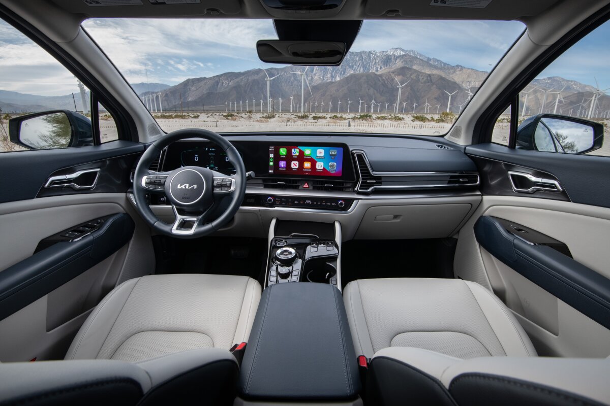 Interior dashboard of 2025 Kia Sportage Hybrid from best hybrid crossover review showcasing hybrid SUV tech