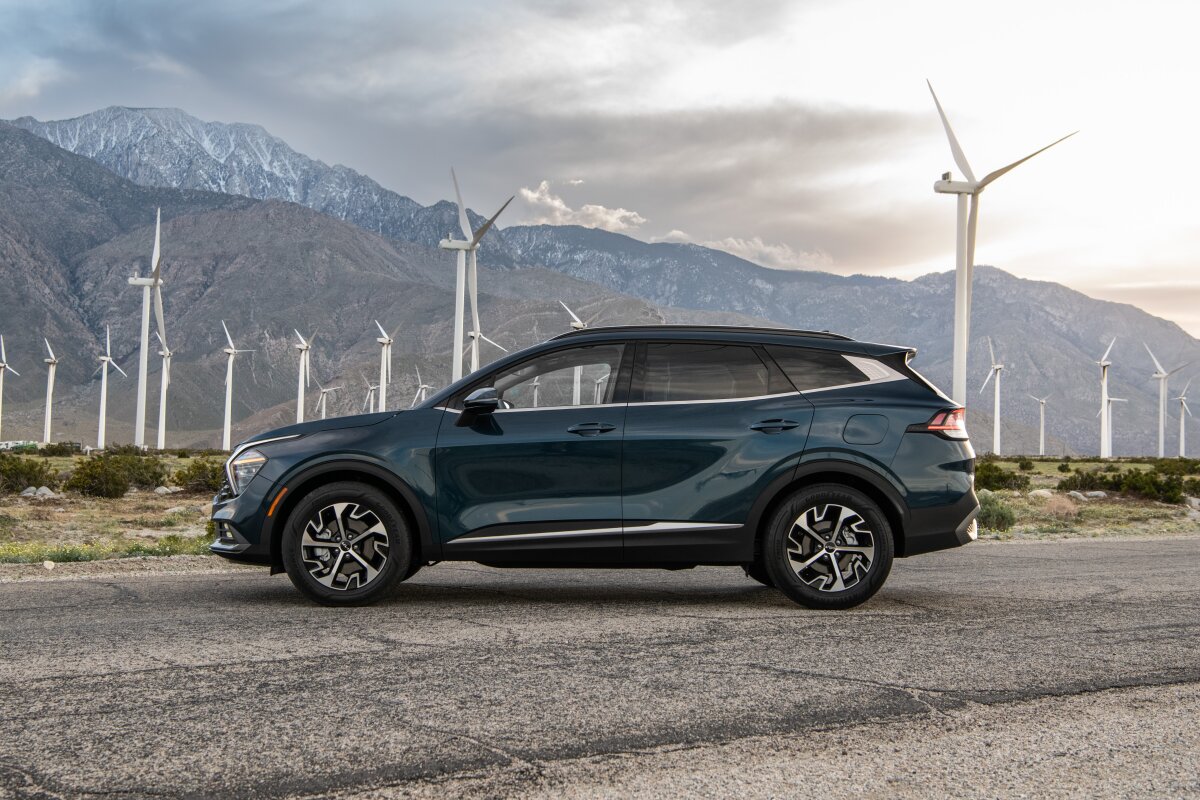 Side profile of 2025 hybrid crossover SUVs including Toyota RAV4 and Kia Sportage from best hybrid crossover review