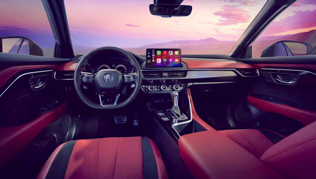 Interior dash view from the 2025 Acura ADX review featuring the Acura crossover’s 9-inch touchscreen and premium controls in a luxurious cabin.