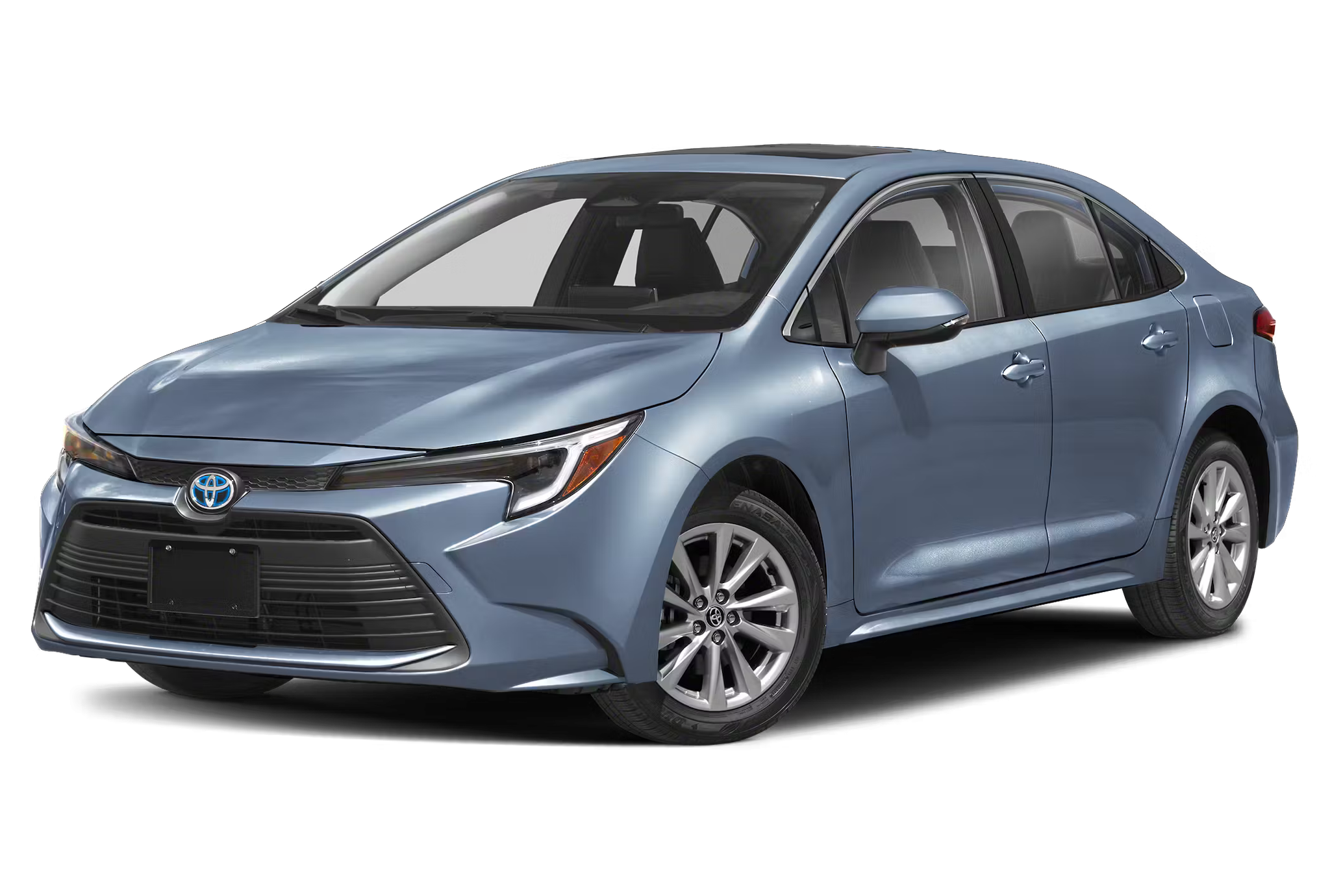 2025 Toyota Corolla Hybrid LE shown at a front three-quarter angle, featuring stylish 16-inch alloy wheels, a modern front fascia with integrated LED daytime running lights, and smooth body lines for an aerodynamic profile.