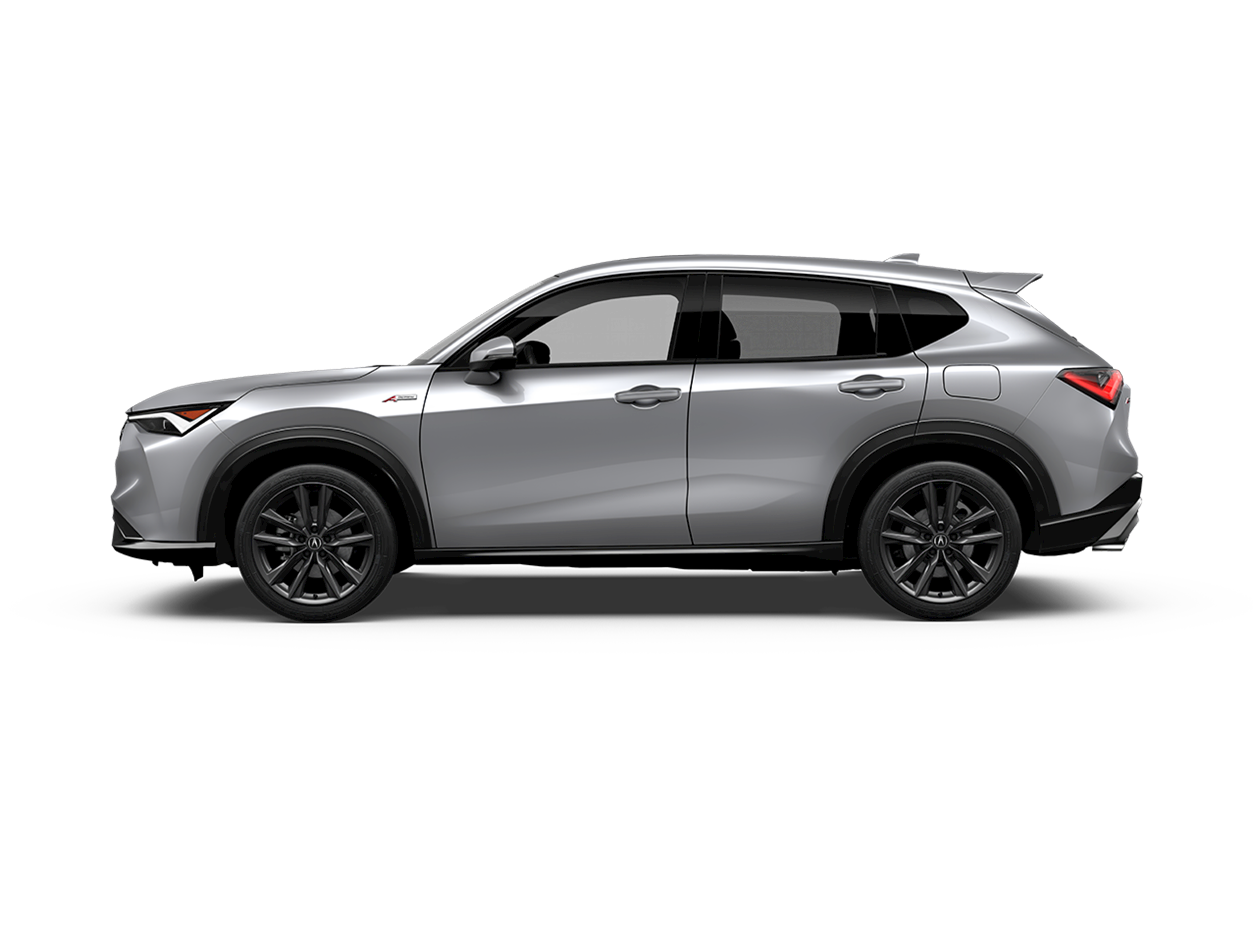 Side view from the 2025 Acura ADX review highlighting the Acura crossover’s sculpted lines and compact stance on a scenic road.