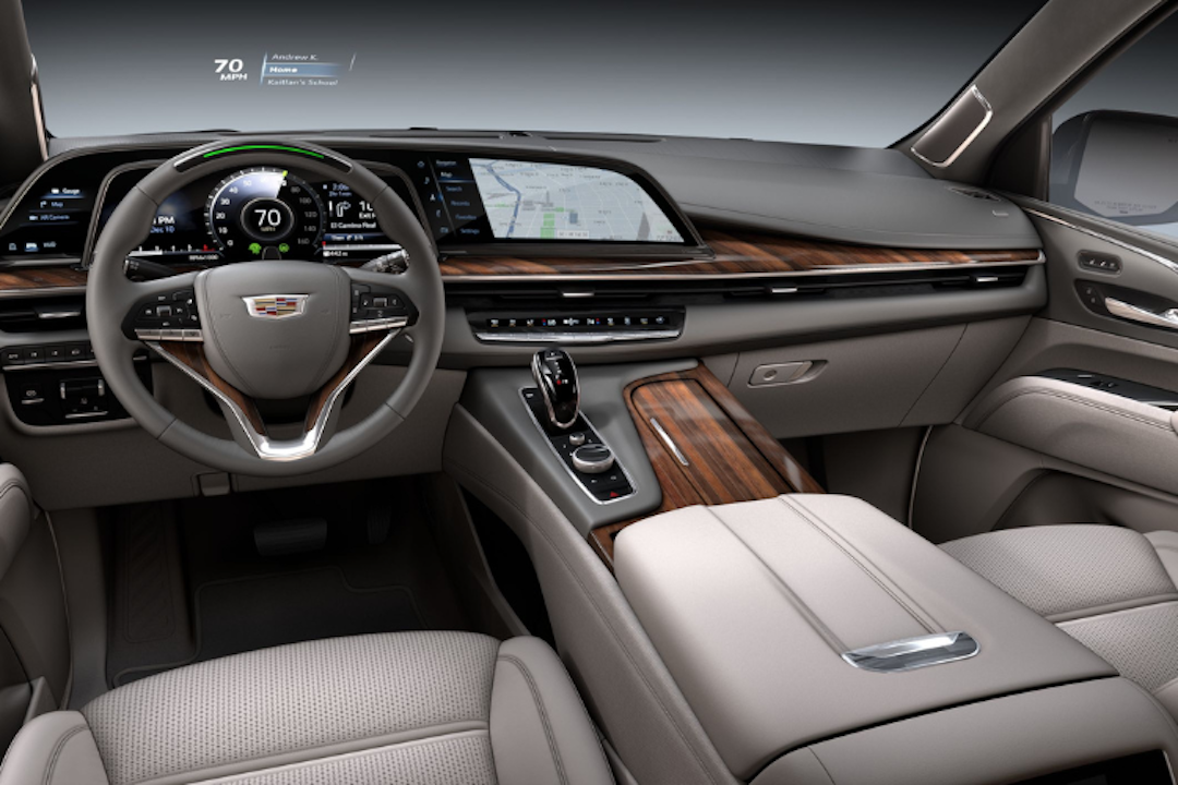 Interior dash of the Escalade luxury lease, featuring a 55-inch touchscreen for 2025