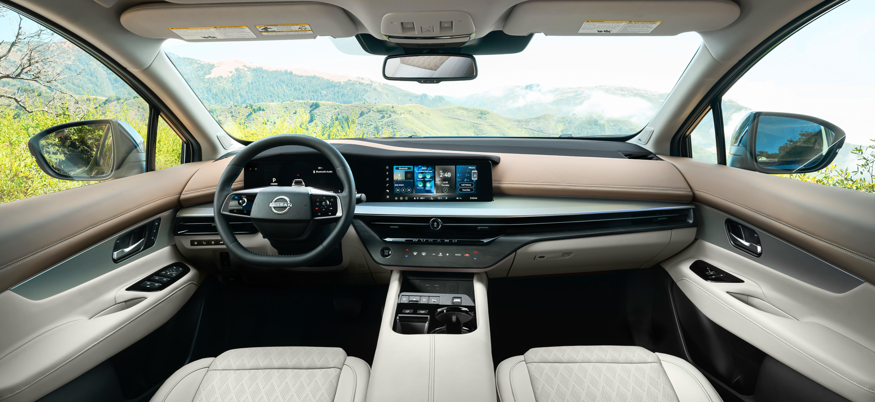 Interior dash of the 2025 Nissan Murano lease, displaying dual 12.3-inch screens and NissanConnect tech.