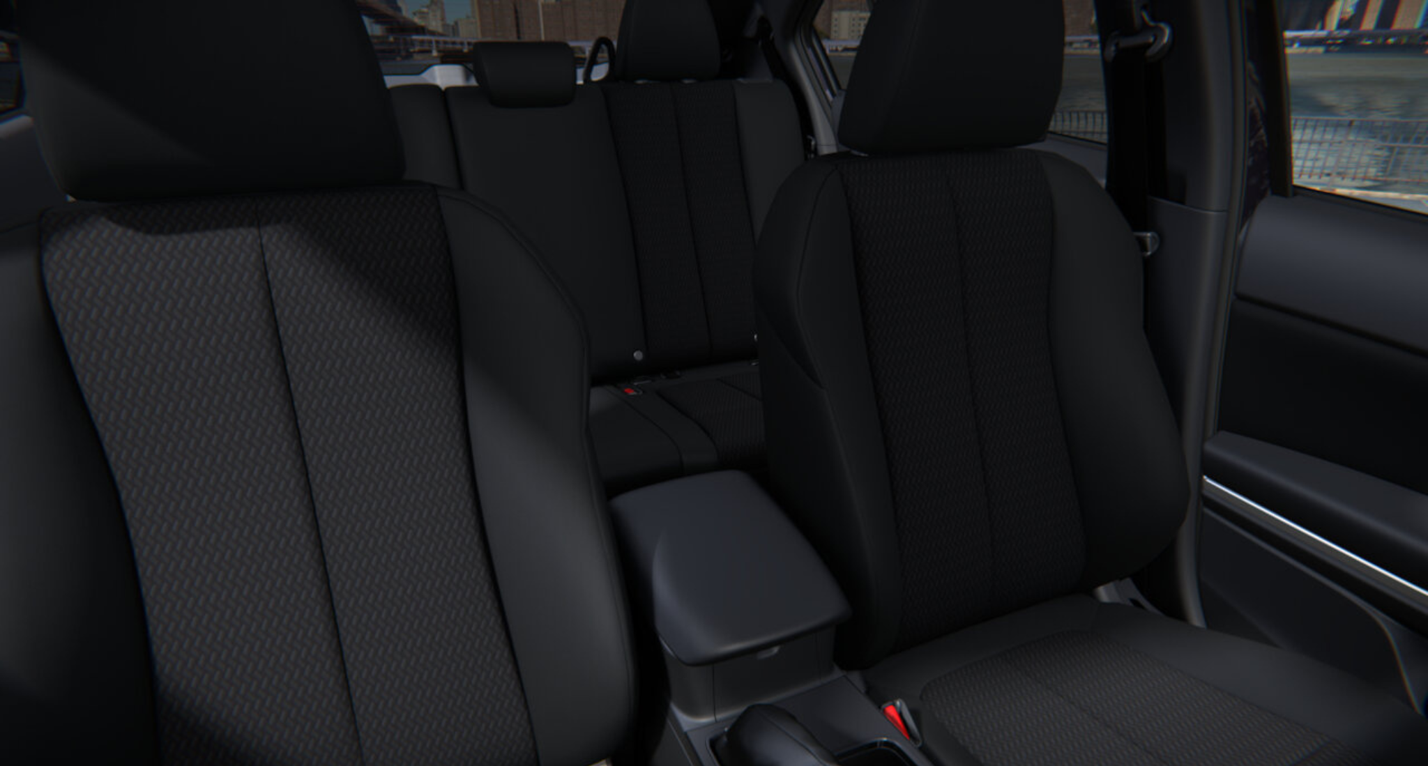aFront and rear fabric seats of the 2025 Mitsubishi Eclipse Cross ES AWD, highlighting passenger space and rear seat folding capability.