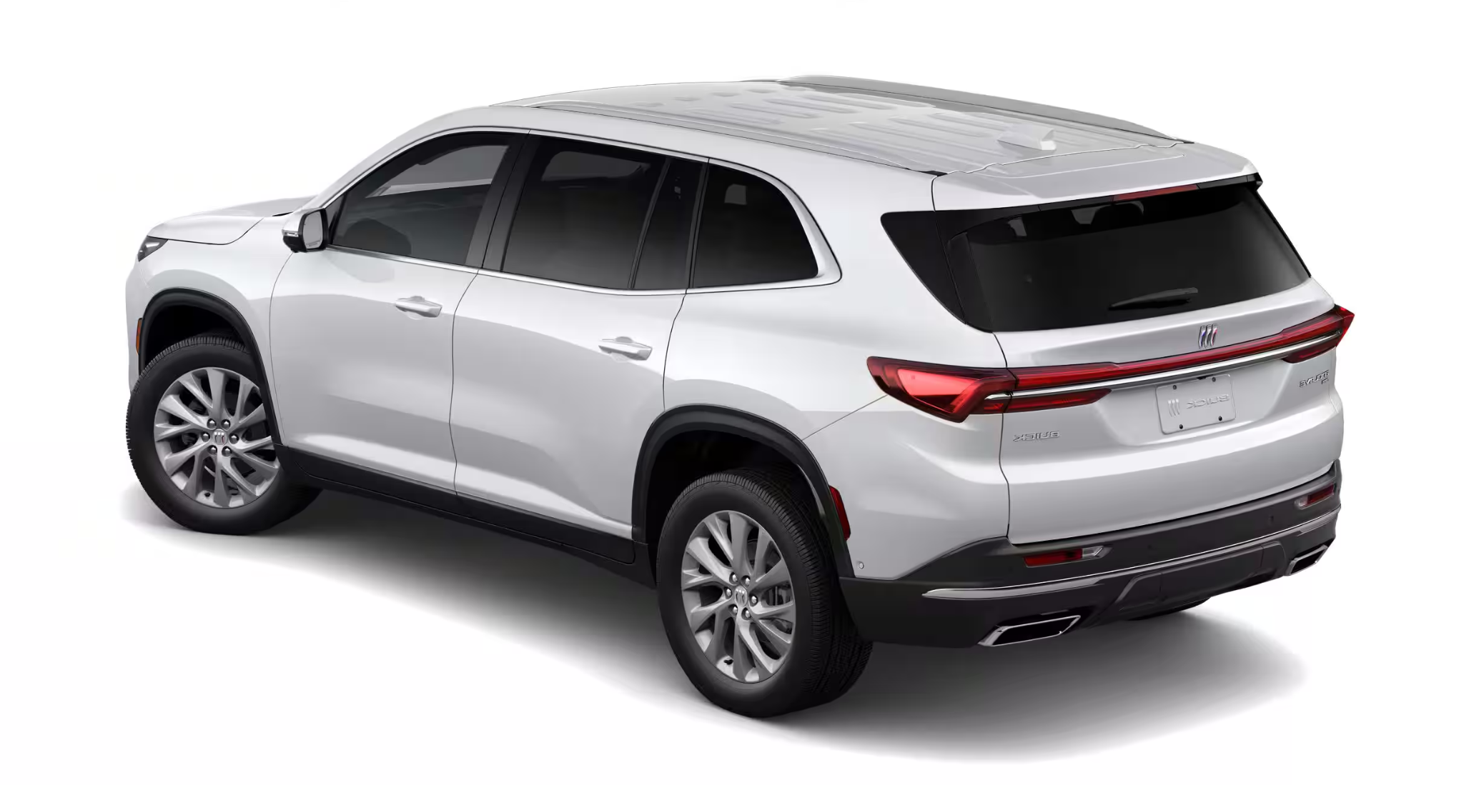 Rear angle of the 2025 Buick Enclave Preferred AWD featuring sleek LED tail lights, dual exhaust outlets, and hands-free power liftgate design.