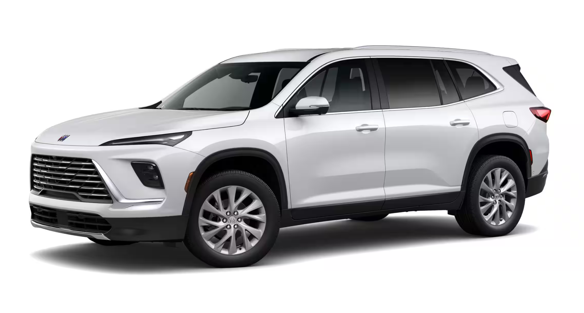 Elegant side profile view of the 2025 Buick Enclave Preferred AWD midsize luxury SUV in Summit White, highlighting its sleek body lines and 20-inch alloy wheels.