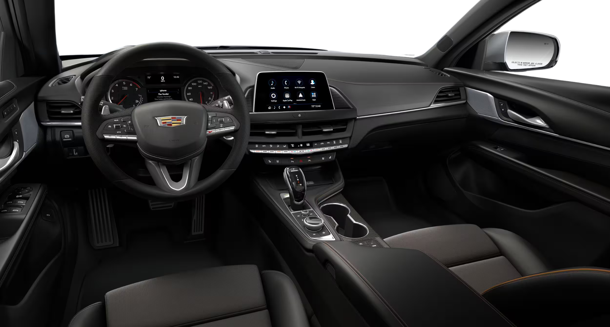 Driver-focused cockpit of the 2025 Cadillac CT4 V-Series AWD showcasing its digital instrument cluster, CUE infotainment system, and premium interior finishes.