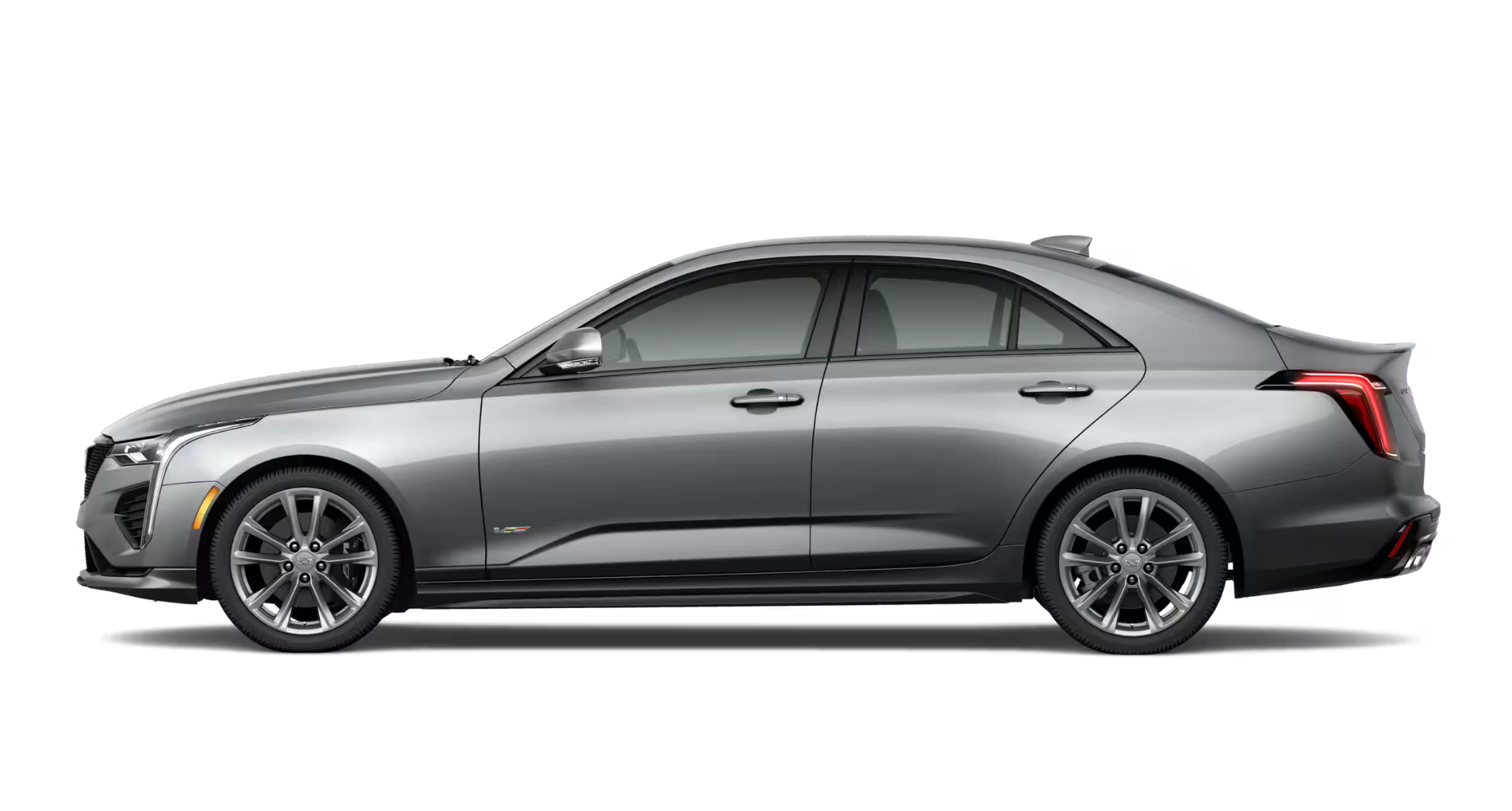 Side profile of the 2025 Cadillac CT4 V-Series AWD highlighting its sleek body lines, 18-inch alloy wheels, and aggressive sport sedan stance.