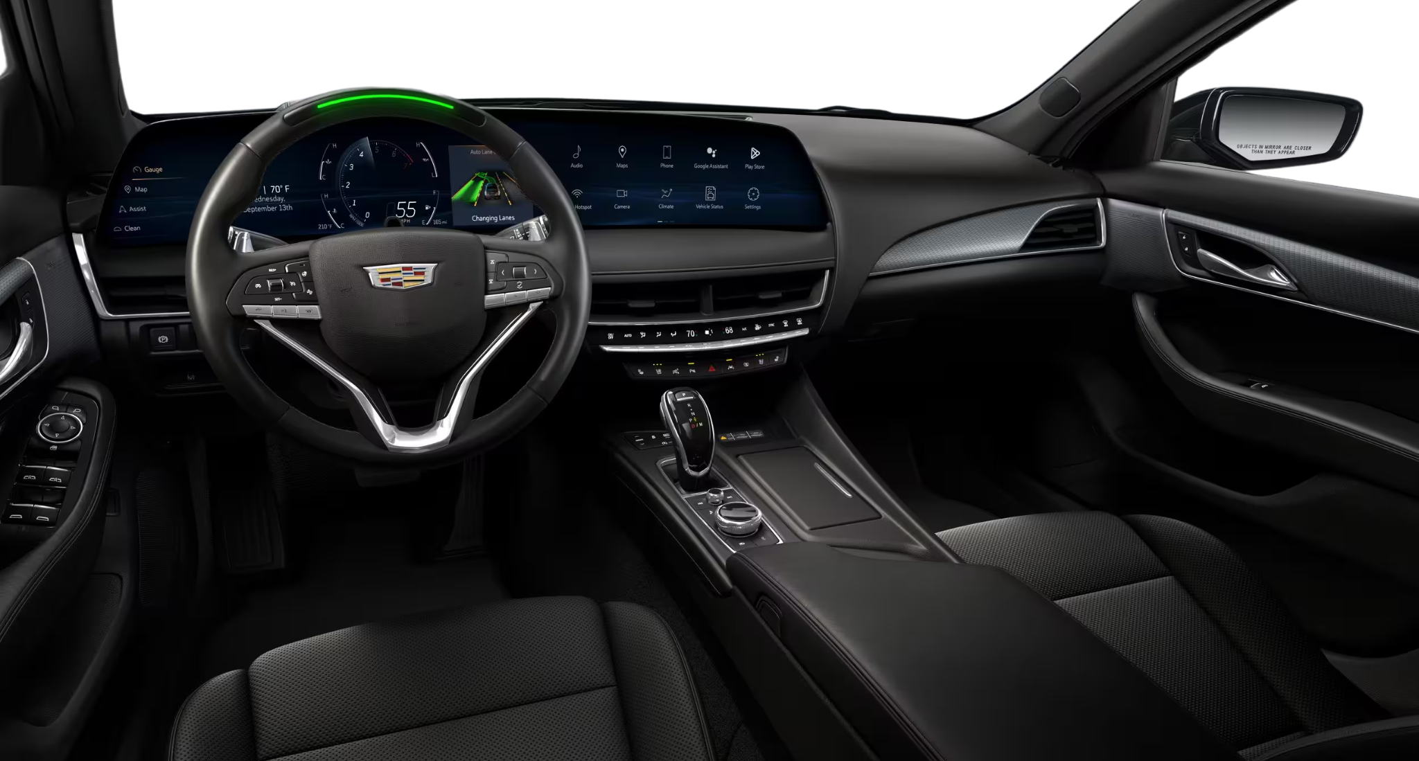 Advanced digital dashboard and steering wheel of the 2025 Cadillac CT5 Premium Luxury featuring a 33-inch LED display with Google Built-In.