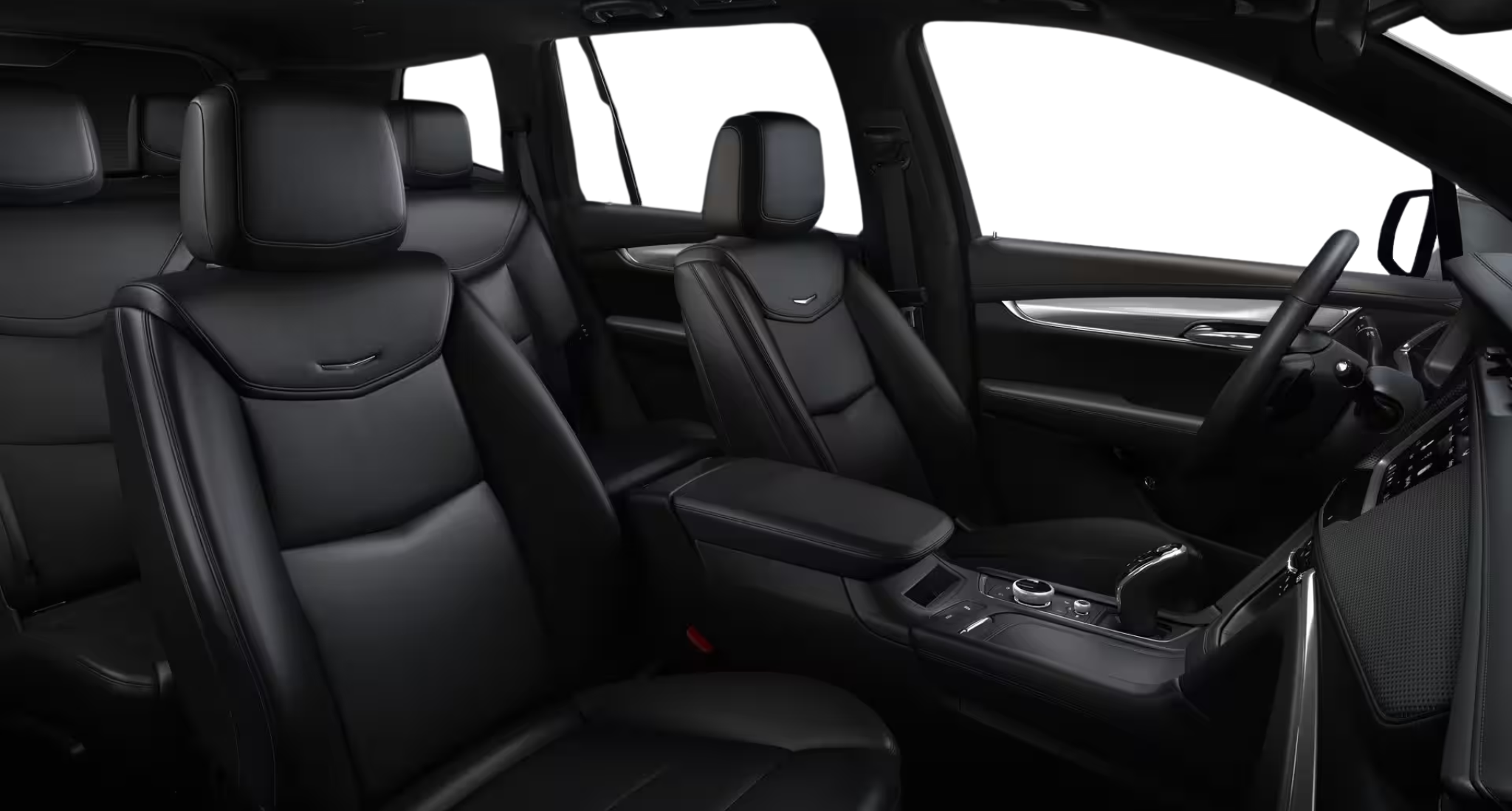 2025 Cadillac Optiq Luxury AWD EV interior view featuring premium black Inteluxe-trimmed seats with spacious cabin design.