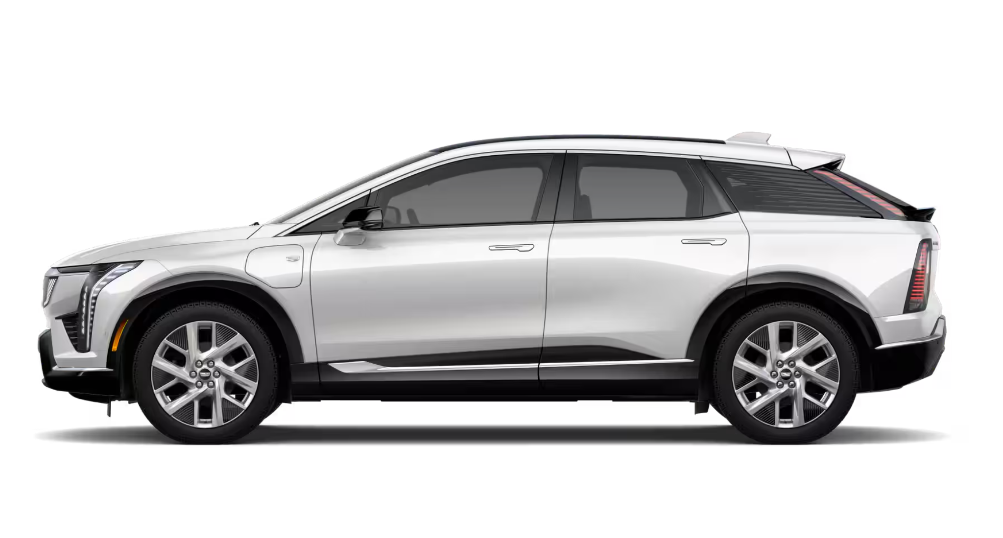 2025 Cadillac Optiq Luxury AWD EV sleek side profile emphasizing aerodynamic lines, 20-inch alloy wheels, and luxury SUV silhouette.