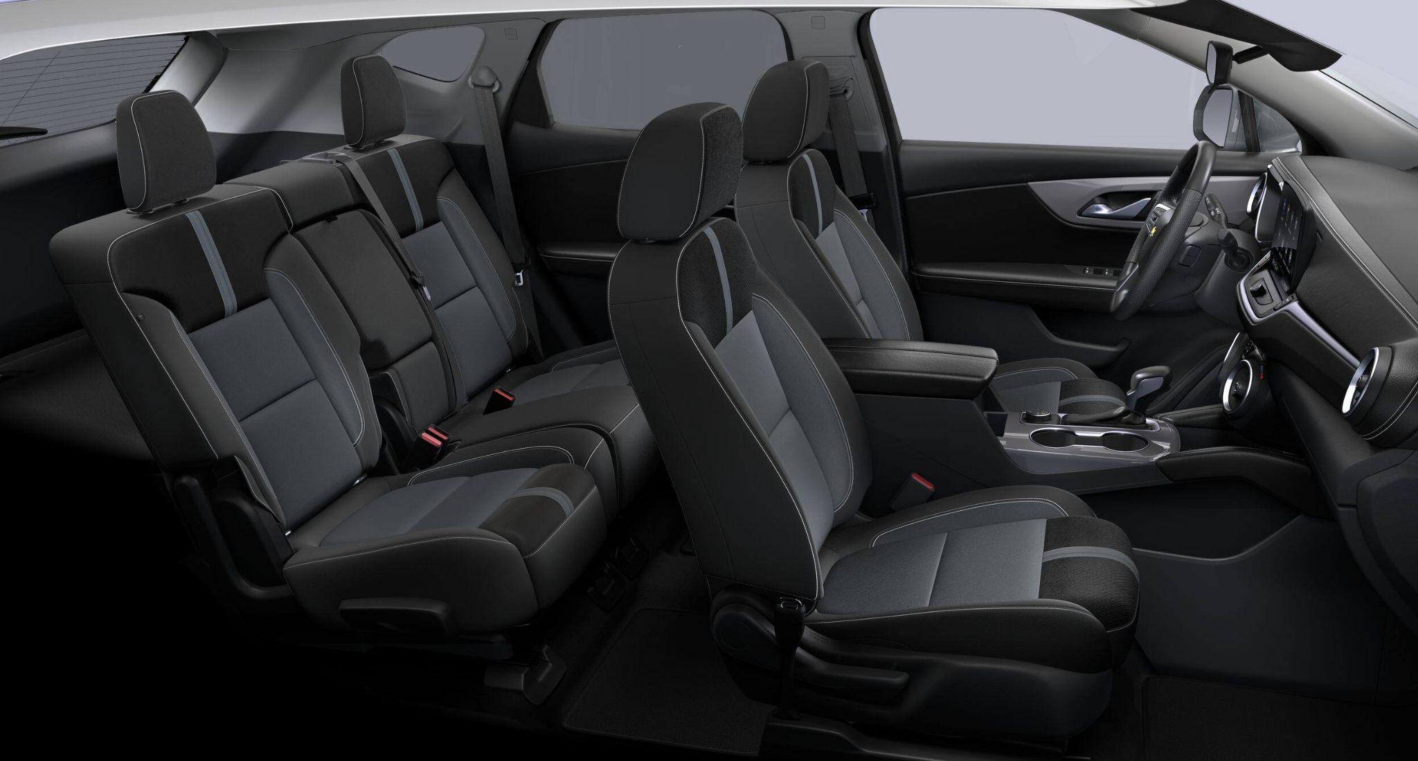 2025 Chevrolet Blazer 2LT interior cabin with dual-tone cloth seats and spacious two-row layout in a modern black finish.