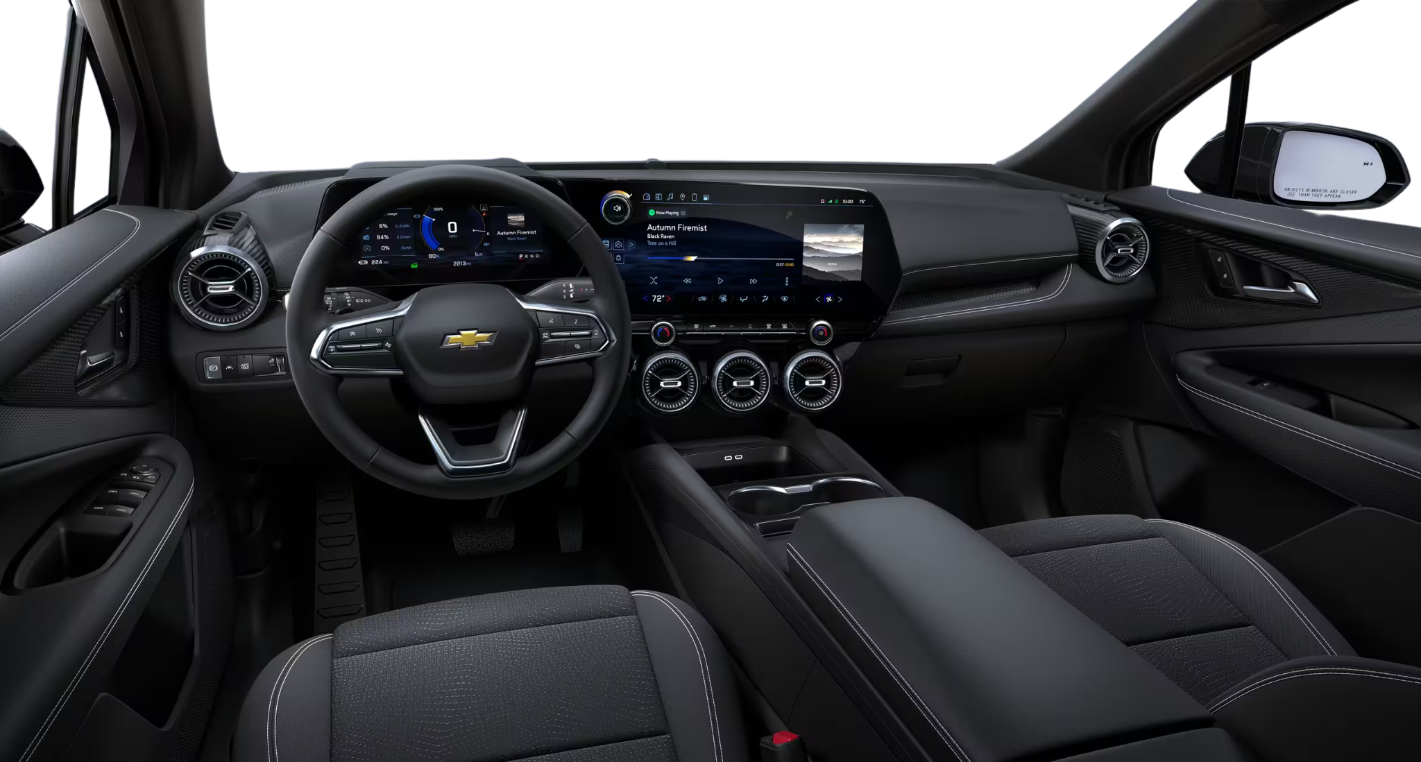 2025 Chevrolet Blazer EV LT dashboard with digital driver display, 17.7-inch touchscreen, and black interior trim with metallic accents.