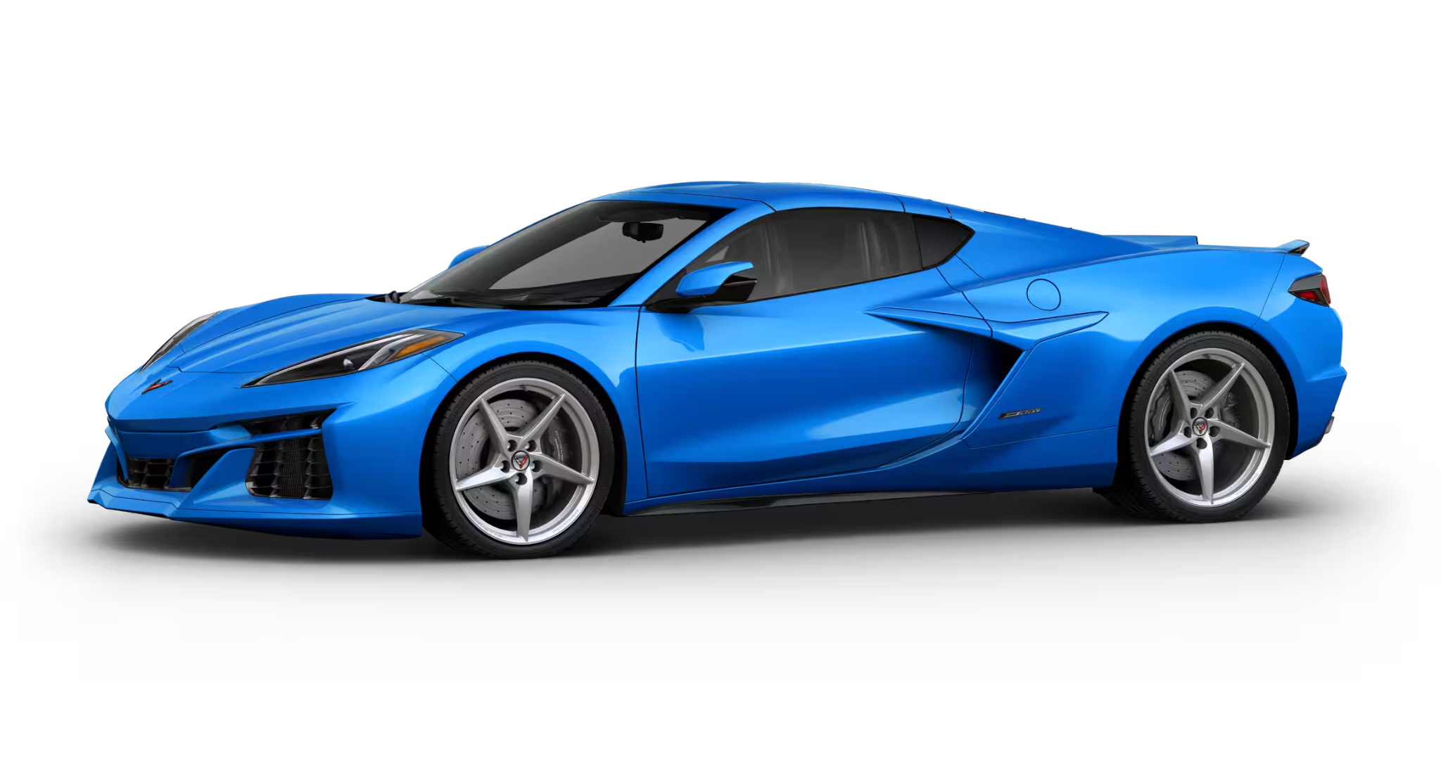 Side profile of the 2025 Corvette E-Ray AWD coupe in bold blue with aerodynamic lines and five-spoke aluminum wheels.