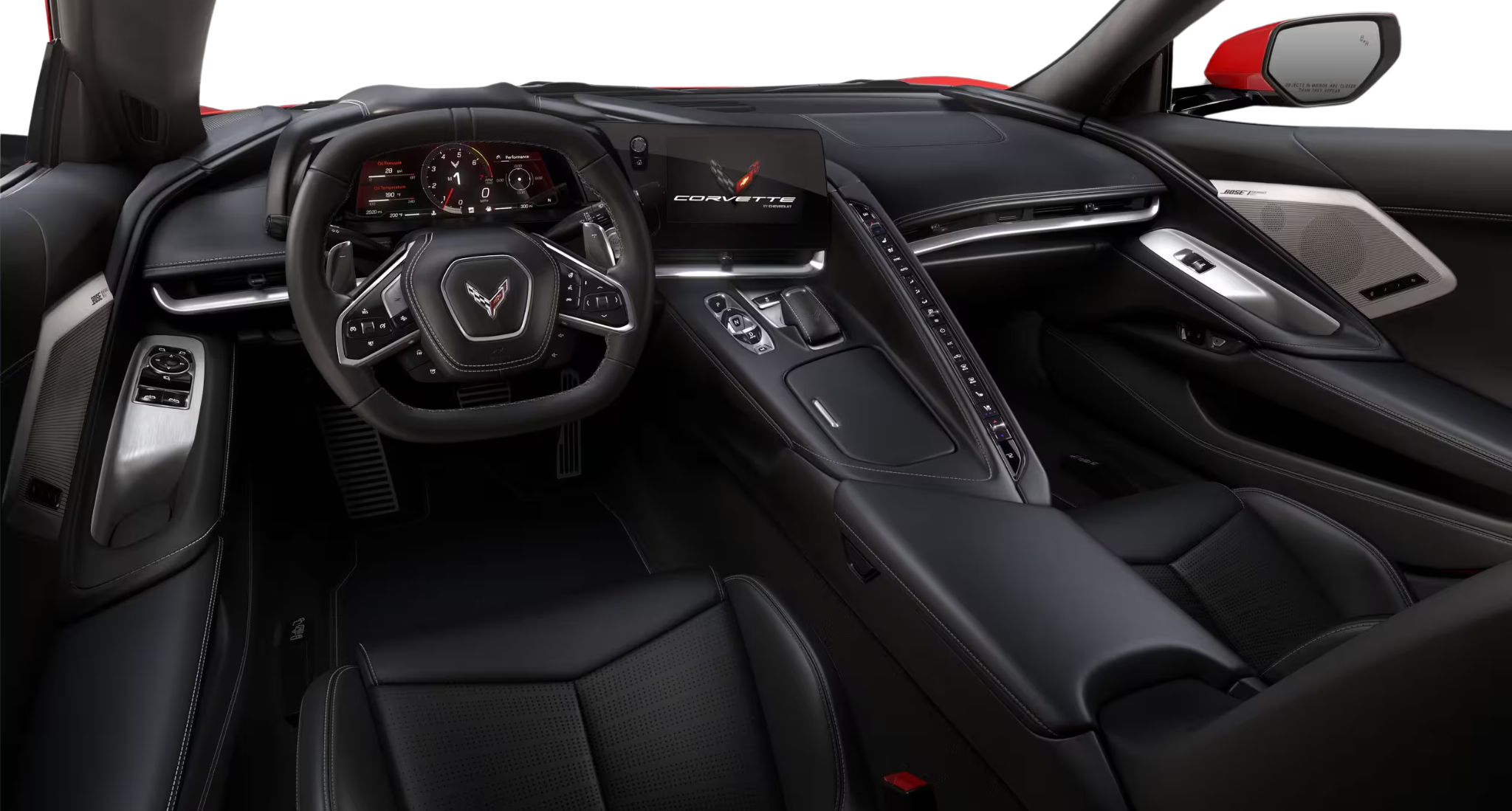 2025 Corvette Stingray dashboard featuring flat-top steering wheel, digital gauge cluster, and 8-inch infotainment screen.