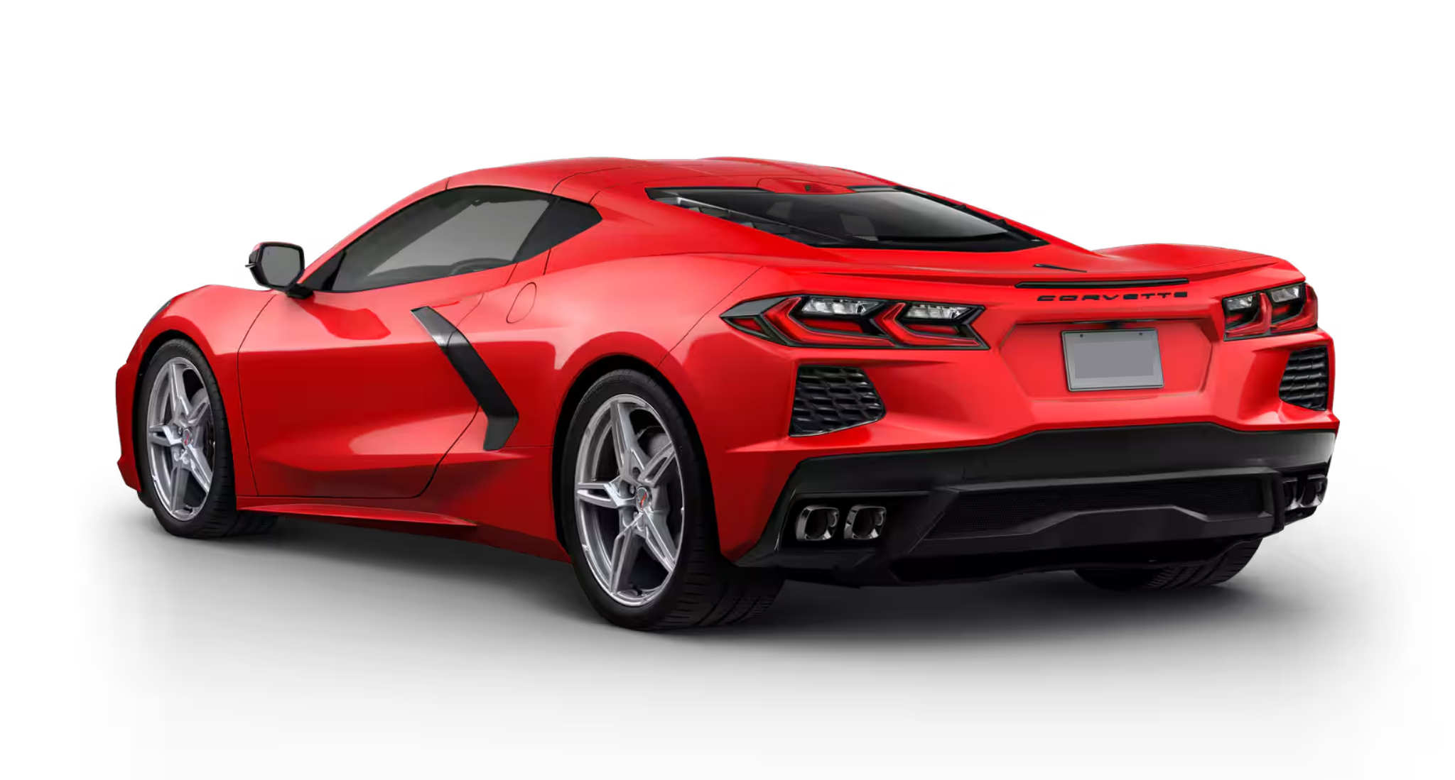 Rear view of the 2025 Chevrolet Corvette Stingray 1LT RWD showcasing quad-tip exhaust, LED taillights, and sculpted body lines.