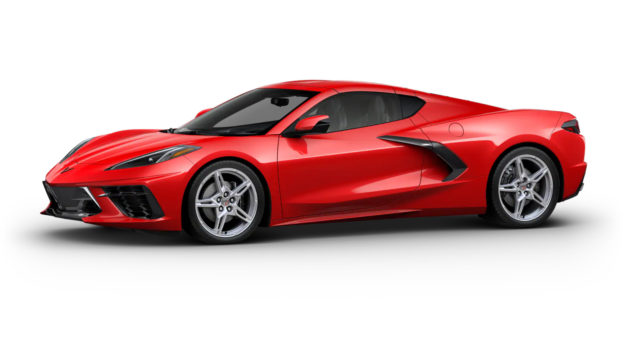 Side profile of the 2025 Chevrolet Corvette Stingray 1LT RWD in Torch Red with aggressive stance and silver aluminum wheels.