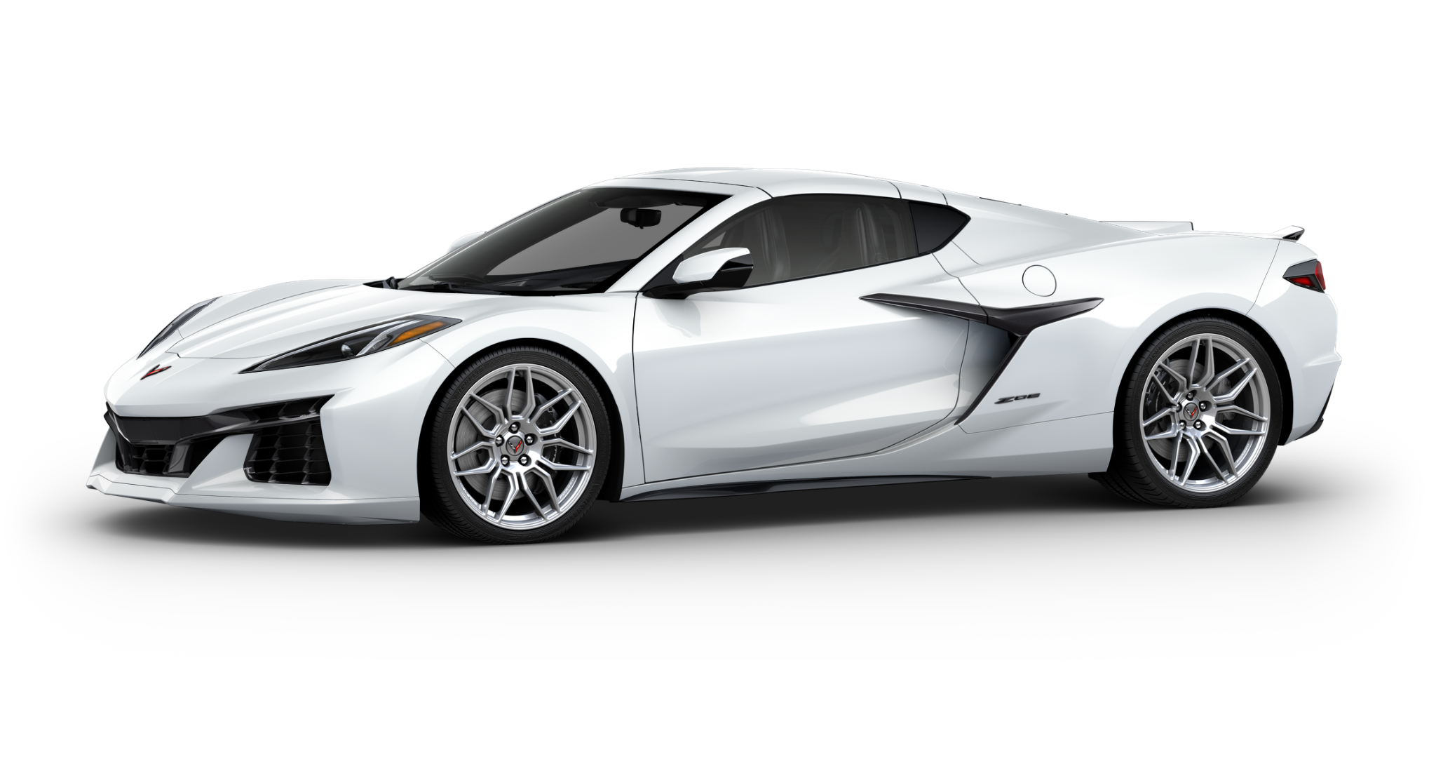 Side profile of the 2025 Corvette Z06 in Arctic White featuring sculpted lines and Z06 badging