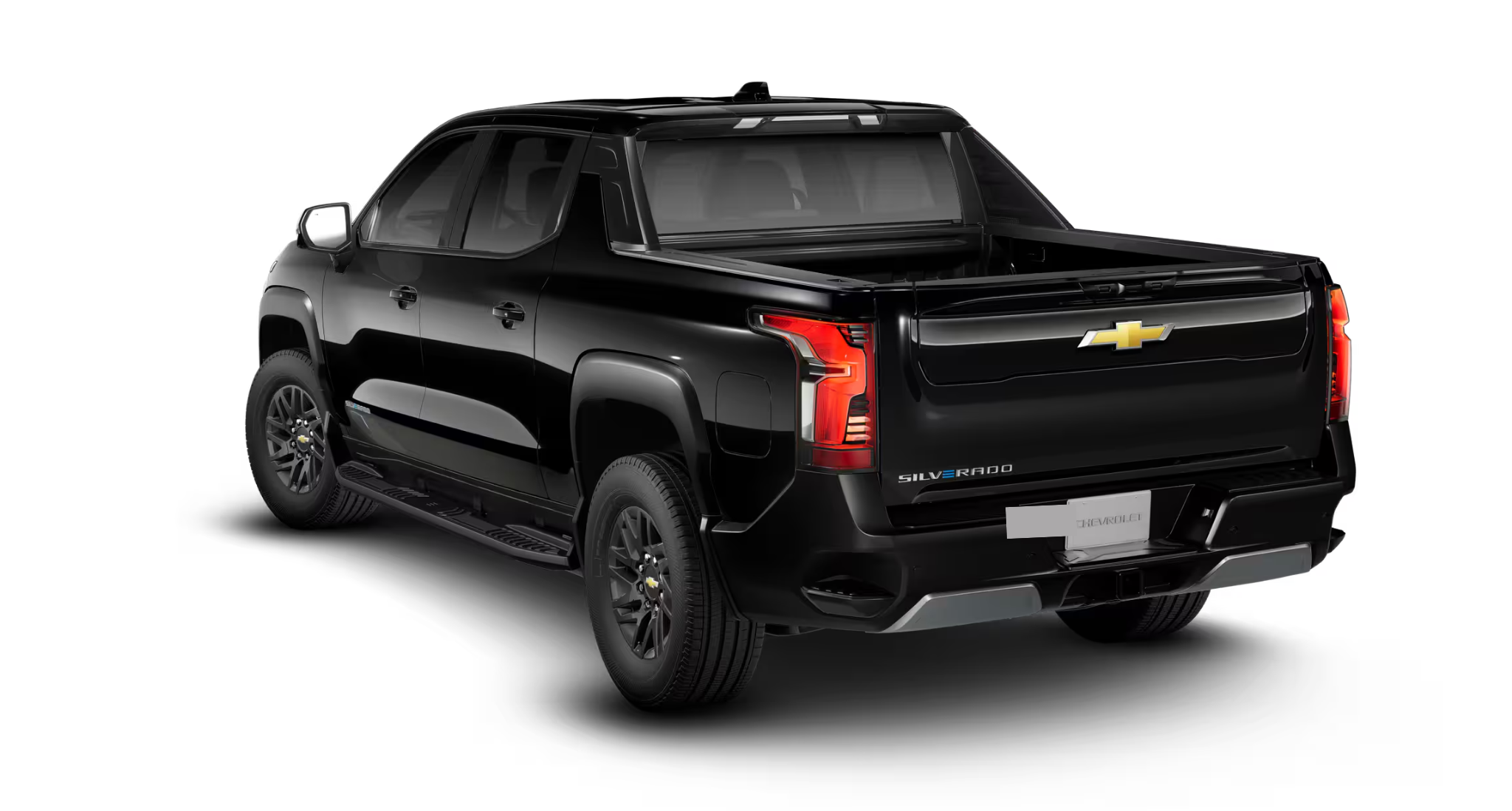 2025 Chevrolet Silverado EV LT in black, rear view showcasing the Multi-Flex Tailgate and modern LED tail lamps